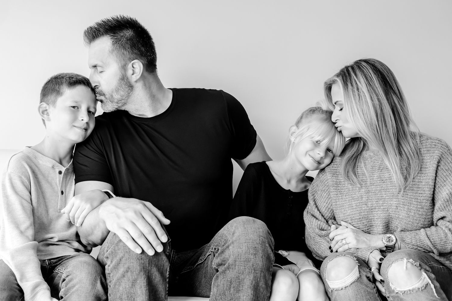 Arlington Heights Family Photographer capturing a sweet moment between parent and child in a studio setting