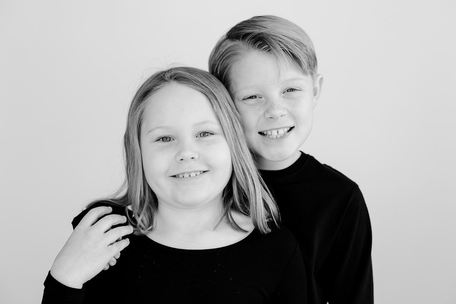 sibling black and white photo of sister and brother in Chicago studio