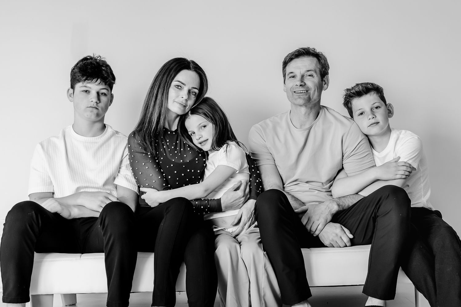 Glenview Studio family portrait capturing genuine smiles and laughter