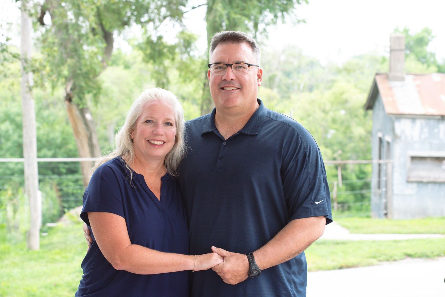 Natural light family photo in Gretna, Nebraska featuring mom and dad.