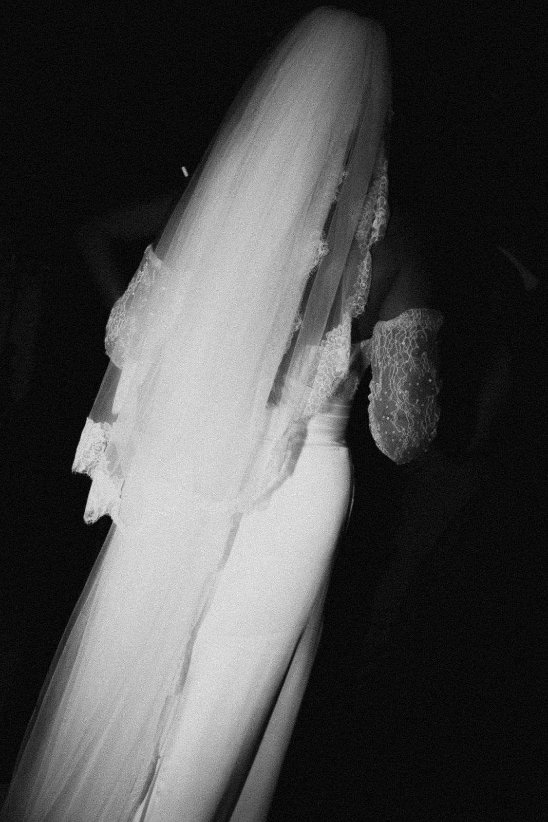 Abstract black and white images showing ghostly white streaks and motion blur against dark backgrounds.