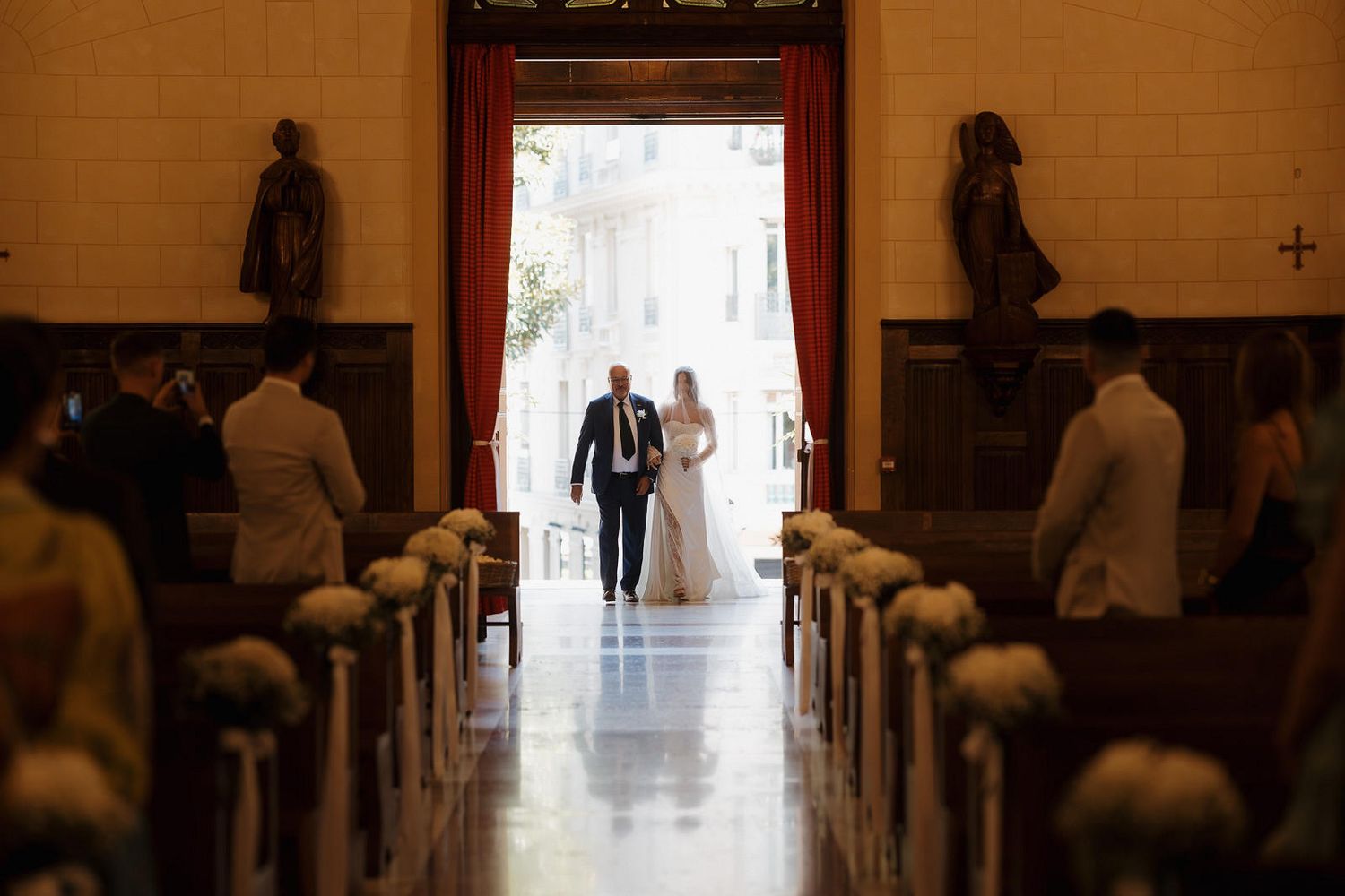 A sequence of photos showing a couple walking through a doorway at a church wedding ceremony.