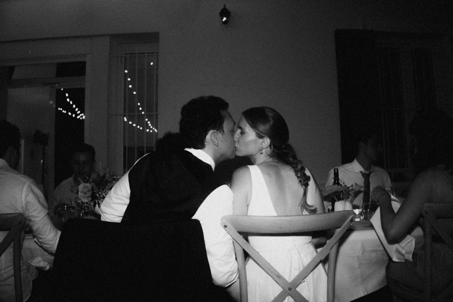 Black and white photo montage showing couples dancing together at what appears to be a formal event or celebration.