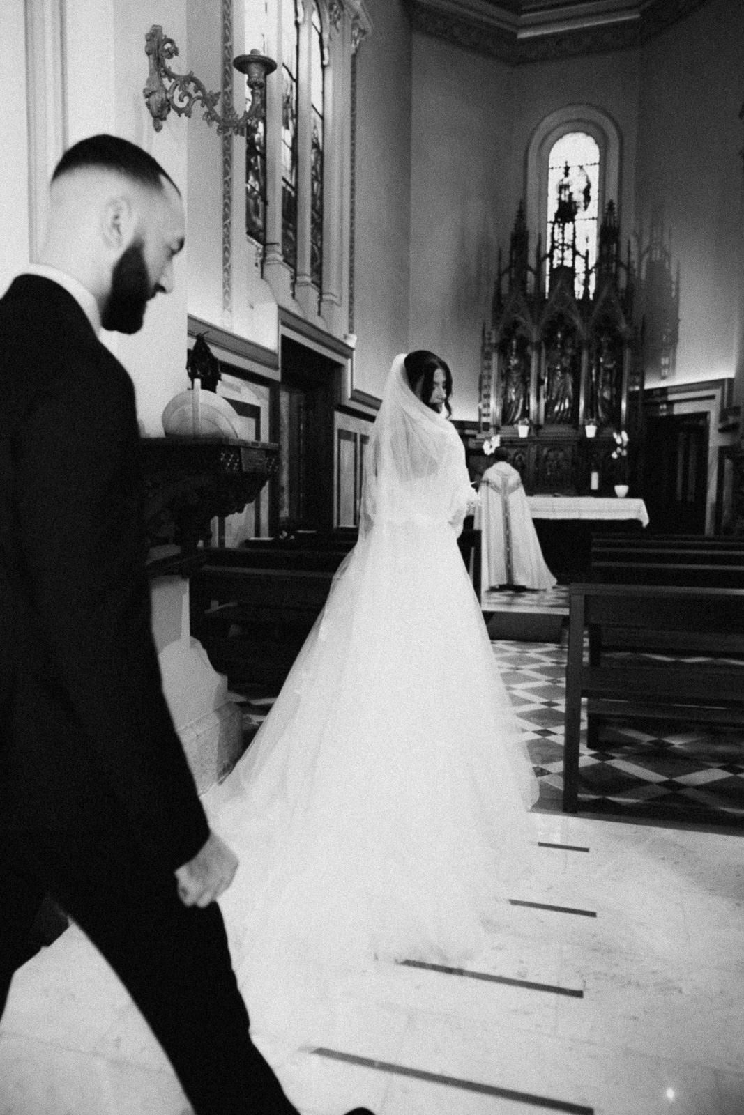 A black and white photo sequence shows a couple running down church aisle after their wedding ceremony.