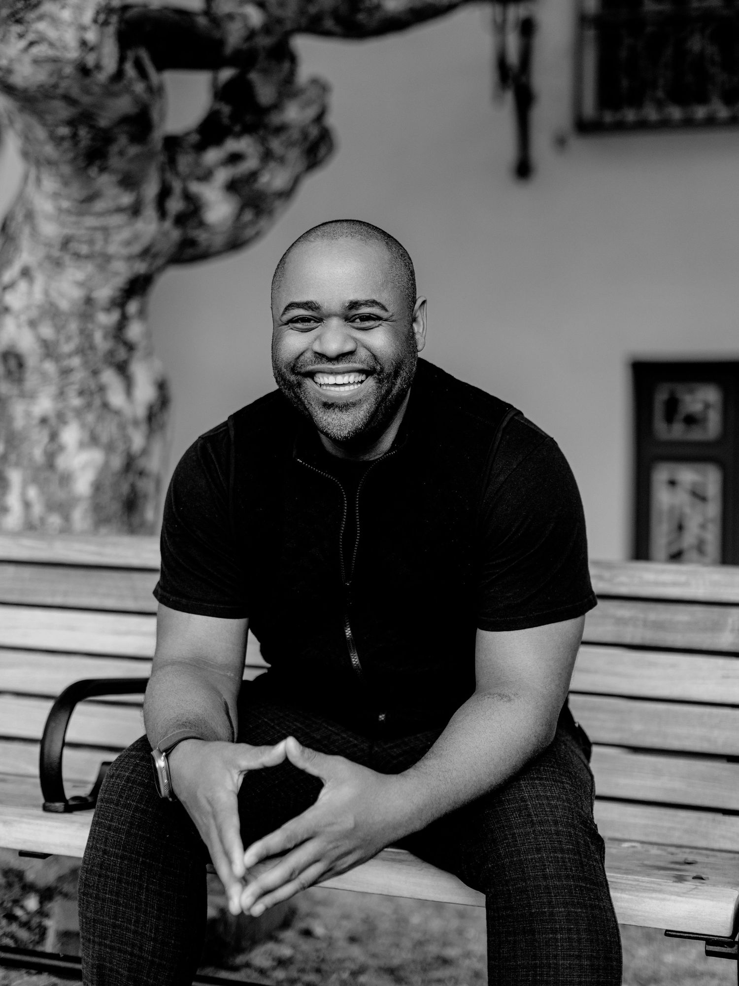 Black and white portrait series showing joyful expressions and genuine laughter.