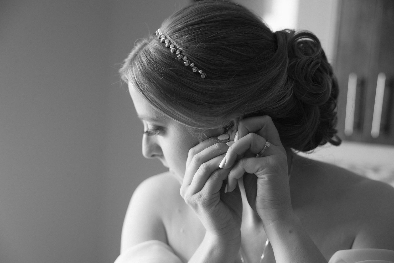 Black and white portrait showing elegant bridal hairstyles with classic updos.