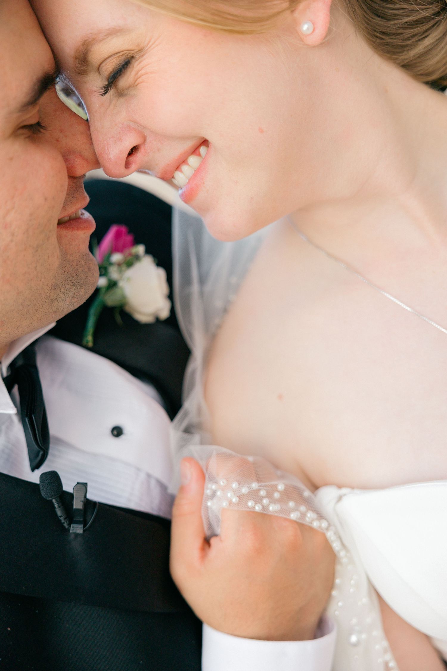 Intimate wedding portrait captures showing tender moments between the couple.