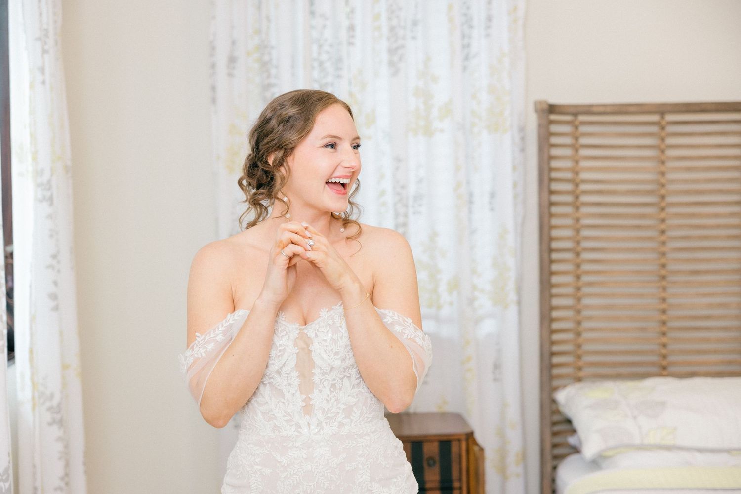 Joyful candid moments captured during wedding preparations.