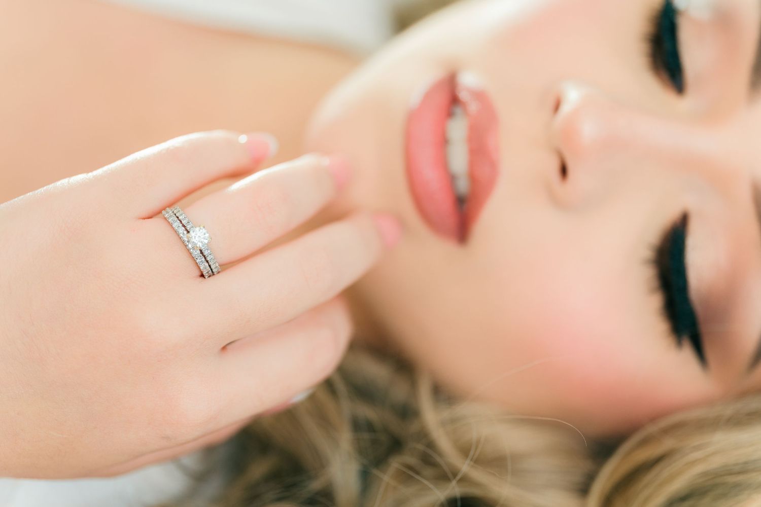 Soft, romantic close-up portrait highlighting delicate details and natural makeup.