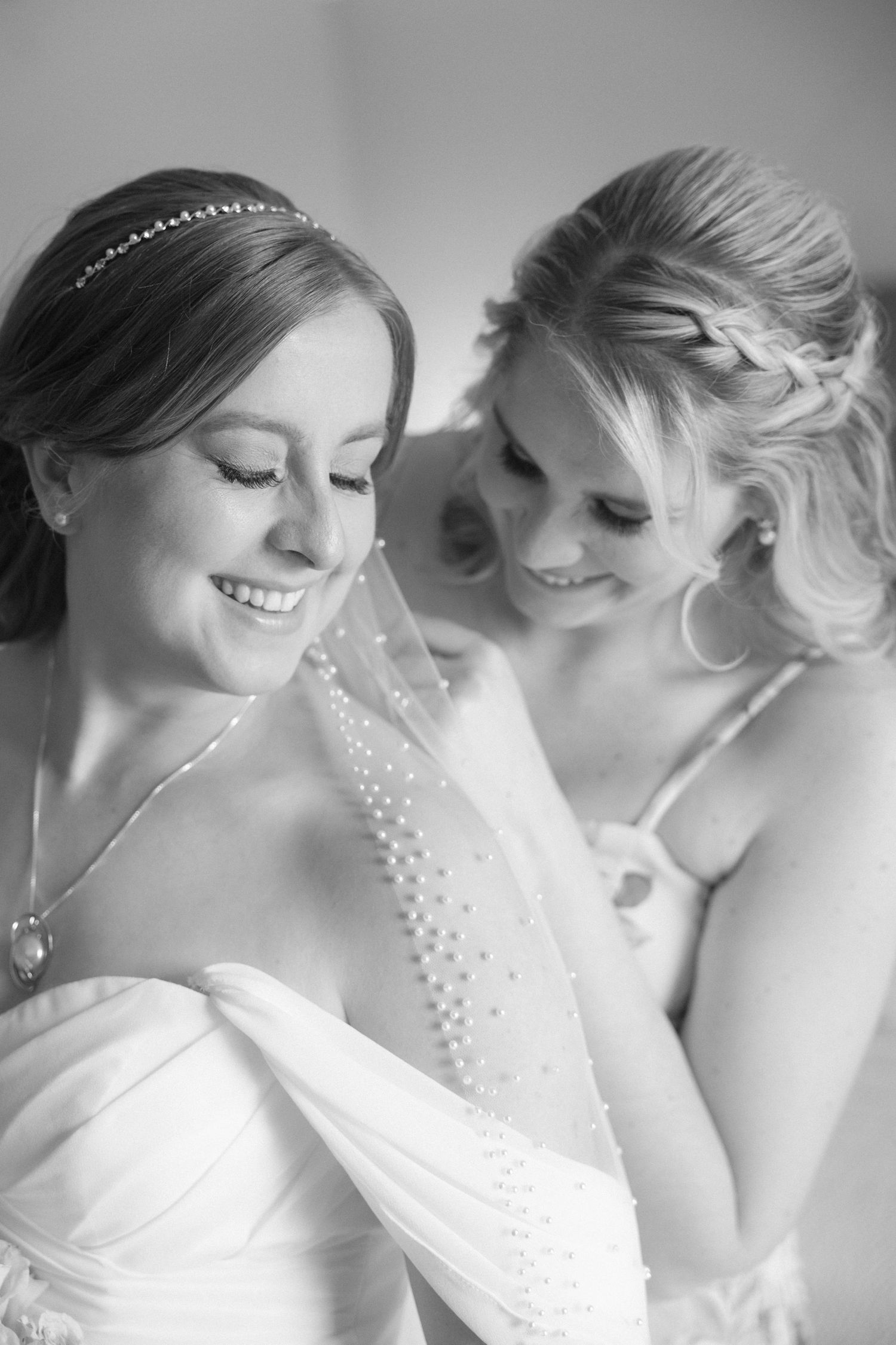 Ethereal black and white portraits showcasing bridal details and veil.