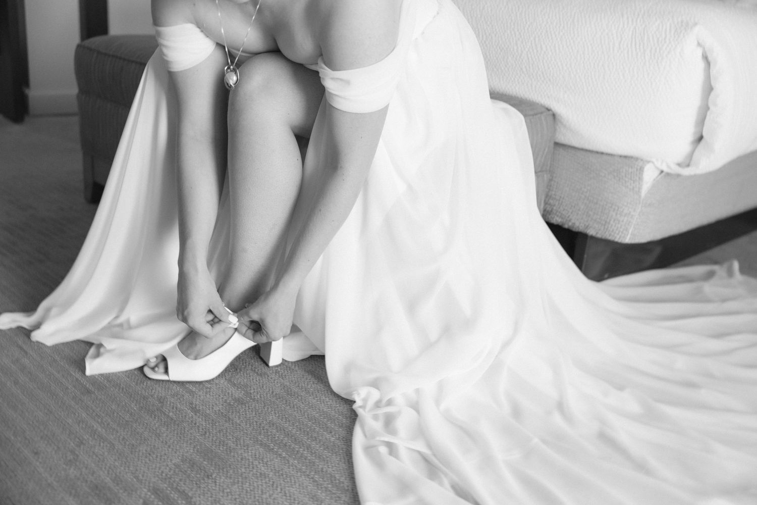 White bridal shoes and dress details captured in an elegant wedding day preparation sequence.