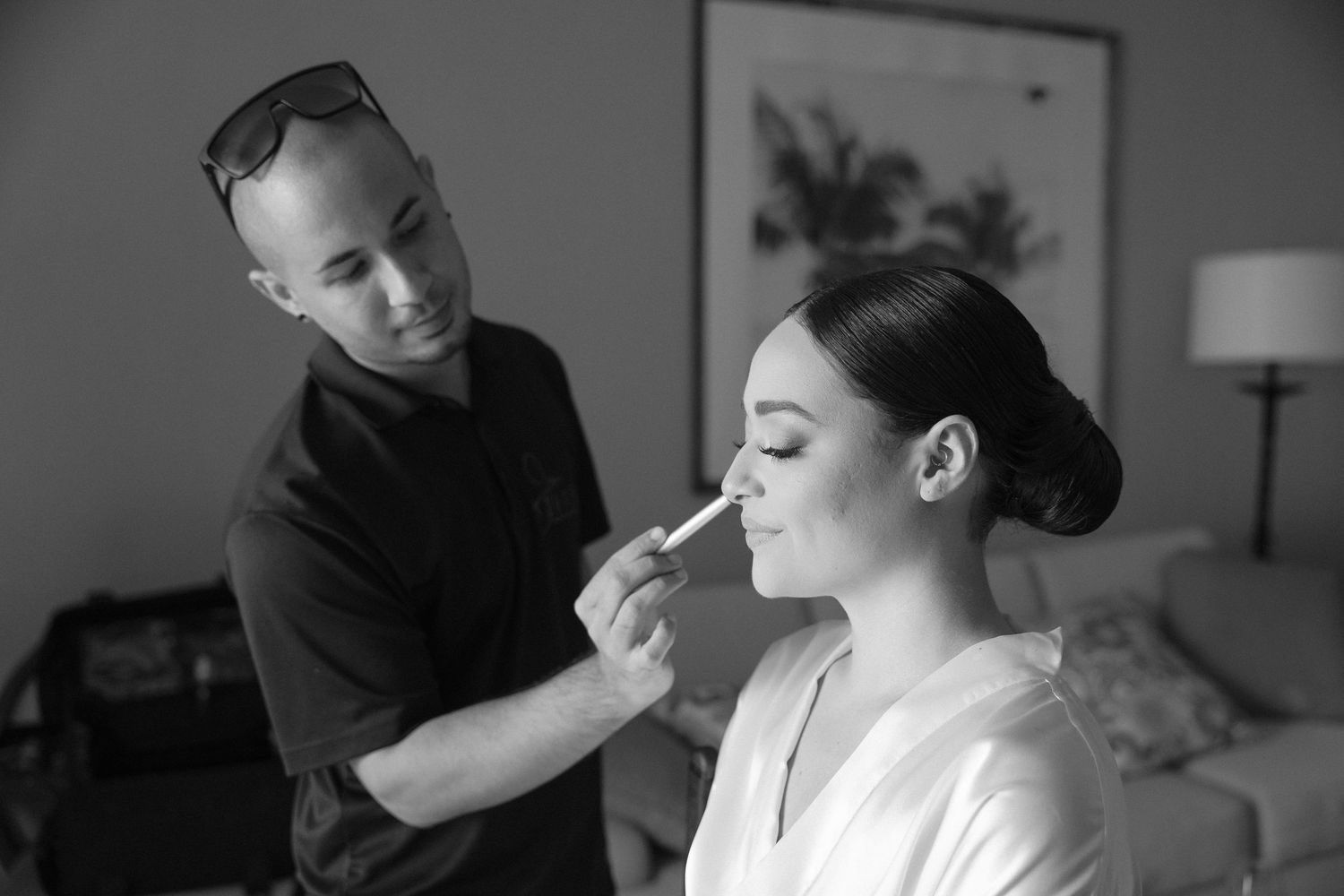 Getting ready sequence showing makeup application and styling.