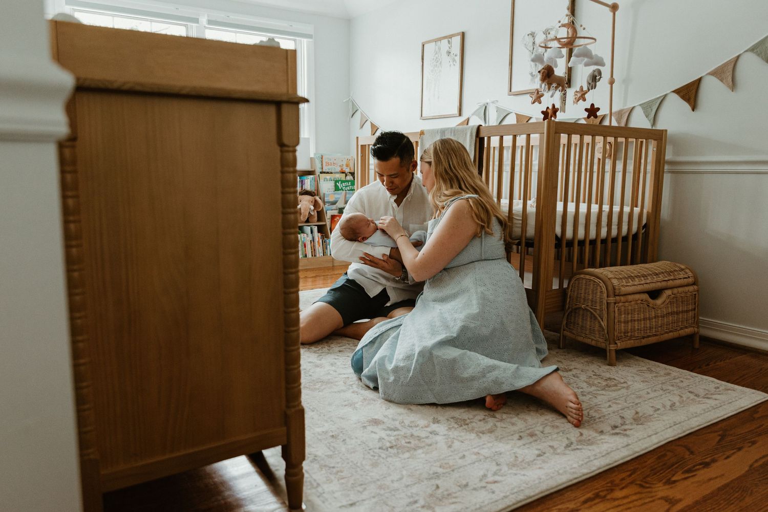 Cozy nursery room with wooden crib and soft lighting creates a peaceful atmosphere for baby and parent.