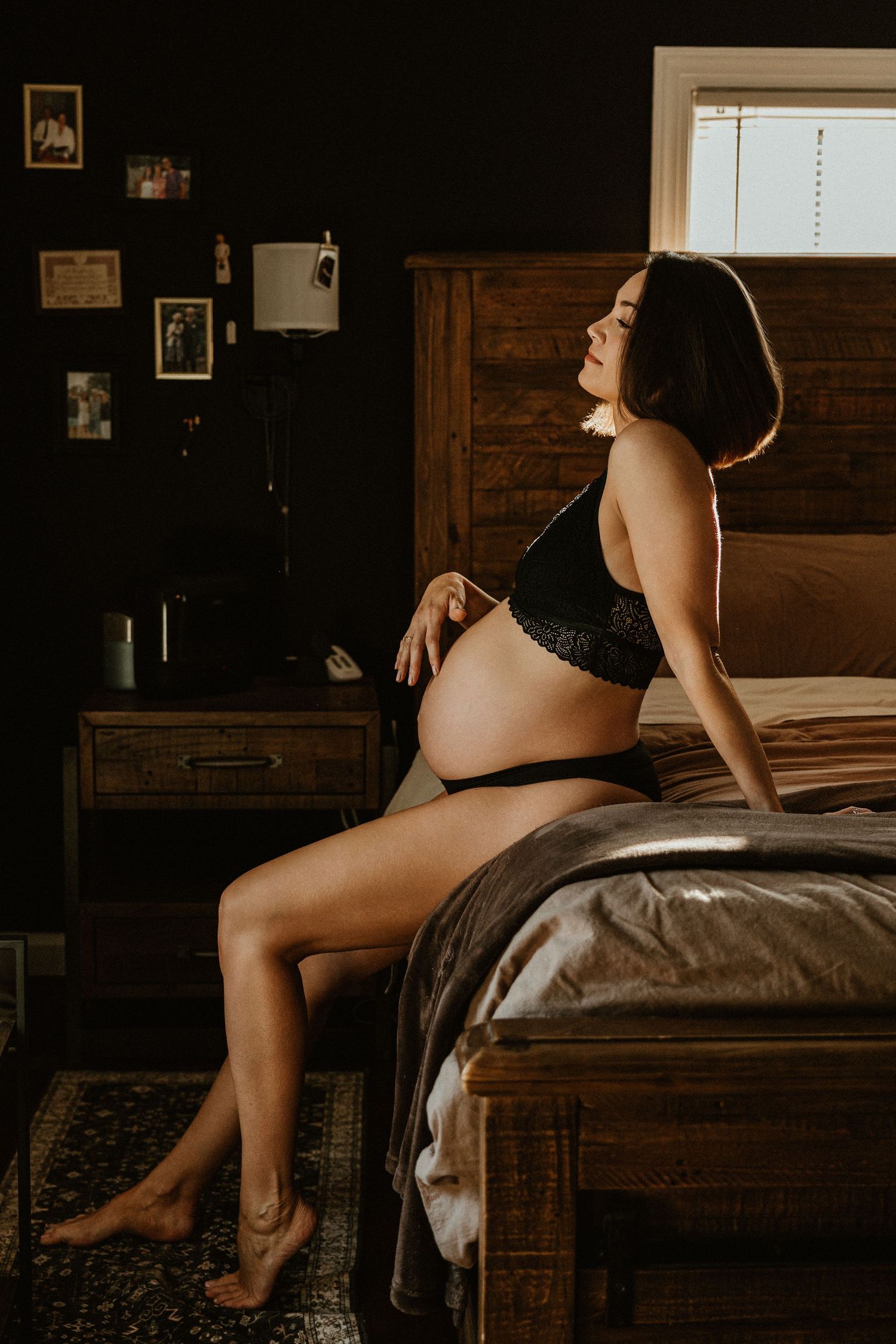 A moody boudoir photoshoot sequence showing silhouetted poses on a bed in a rustic wooden room.
