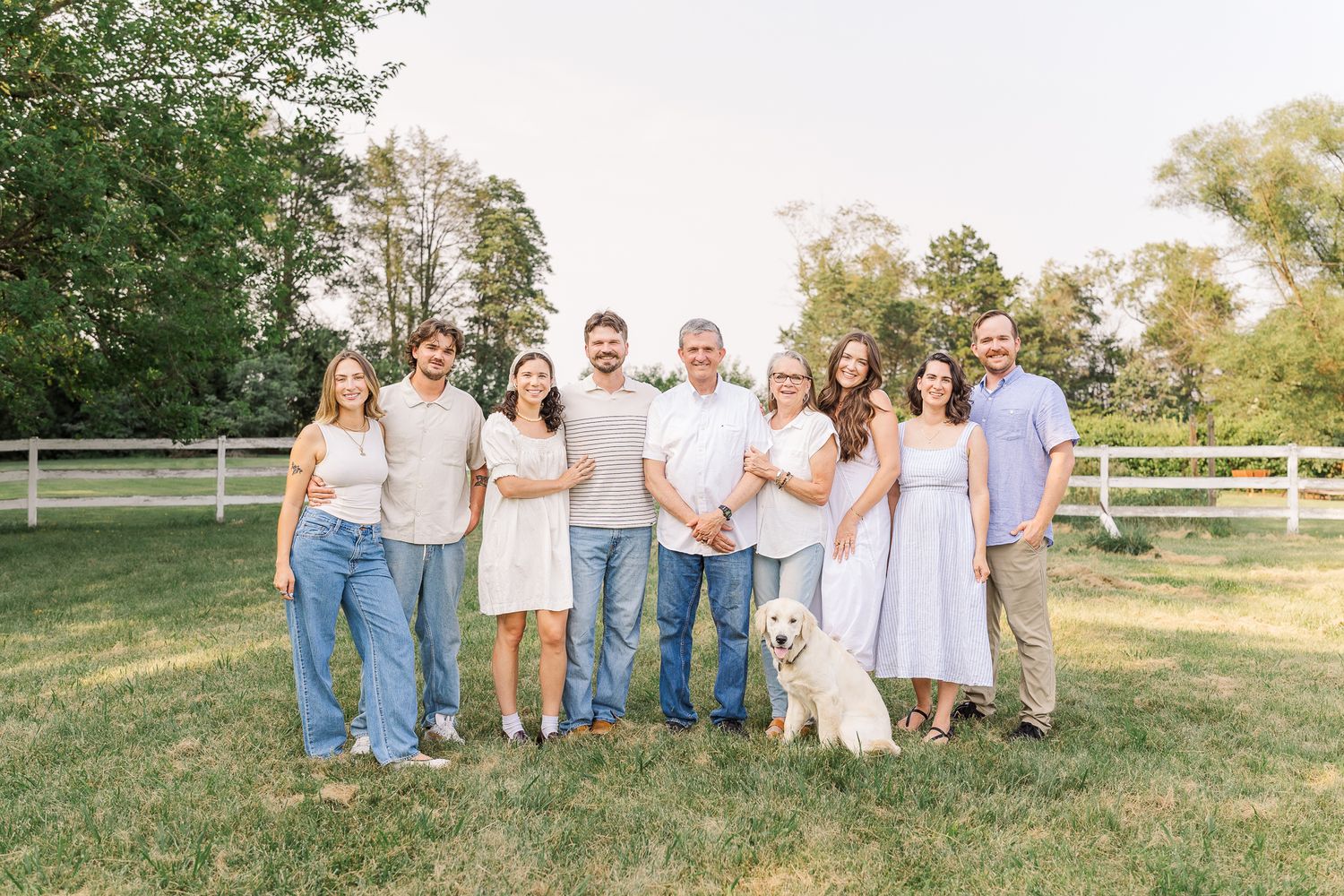 a large extended family smiling together at a photo session in warrenton virginia