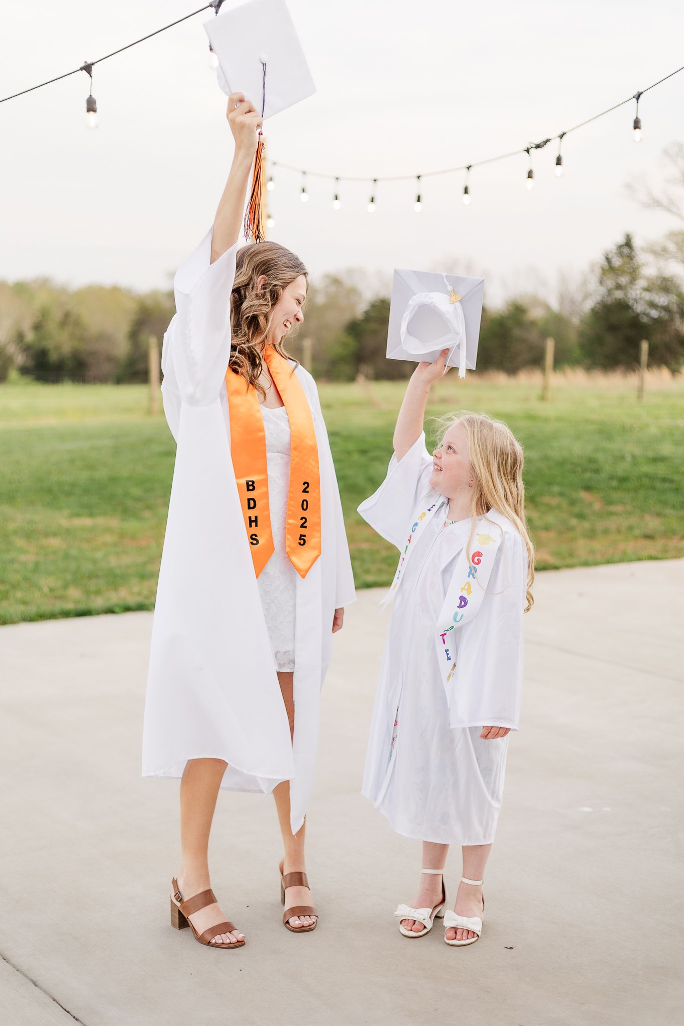 young kids smiling together in graduation photos in nokesville virginia