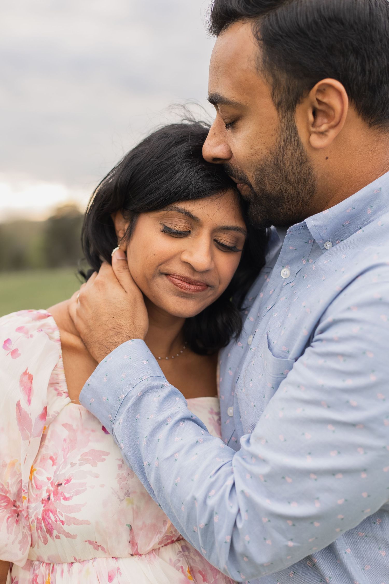 a young couple smiling together during sunset in leesburg virginia