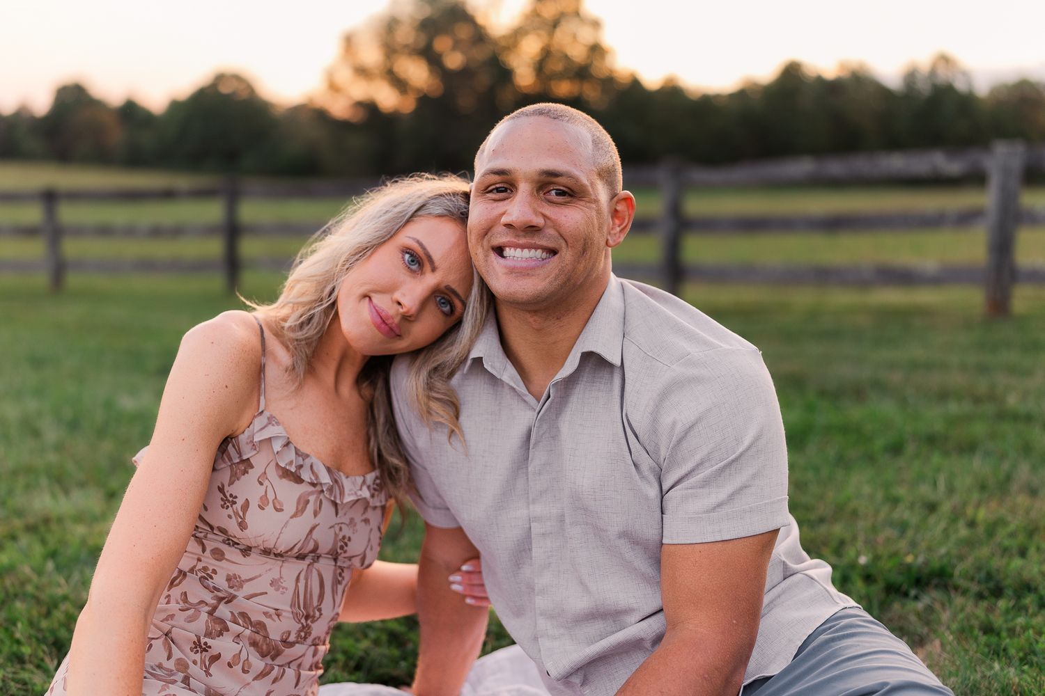 a young couple smiling together during sunset in leesburg virginia