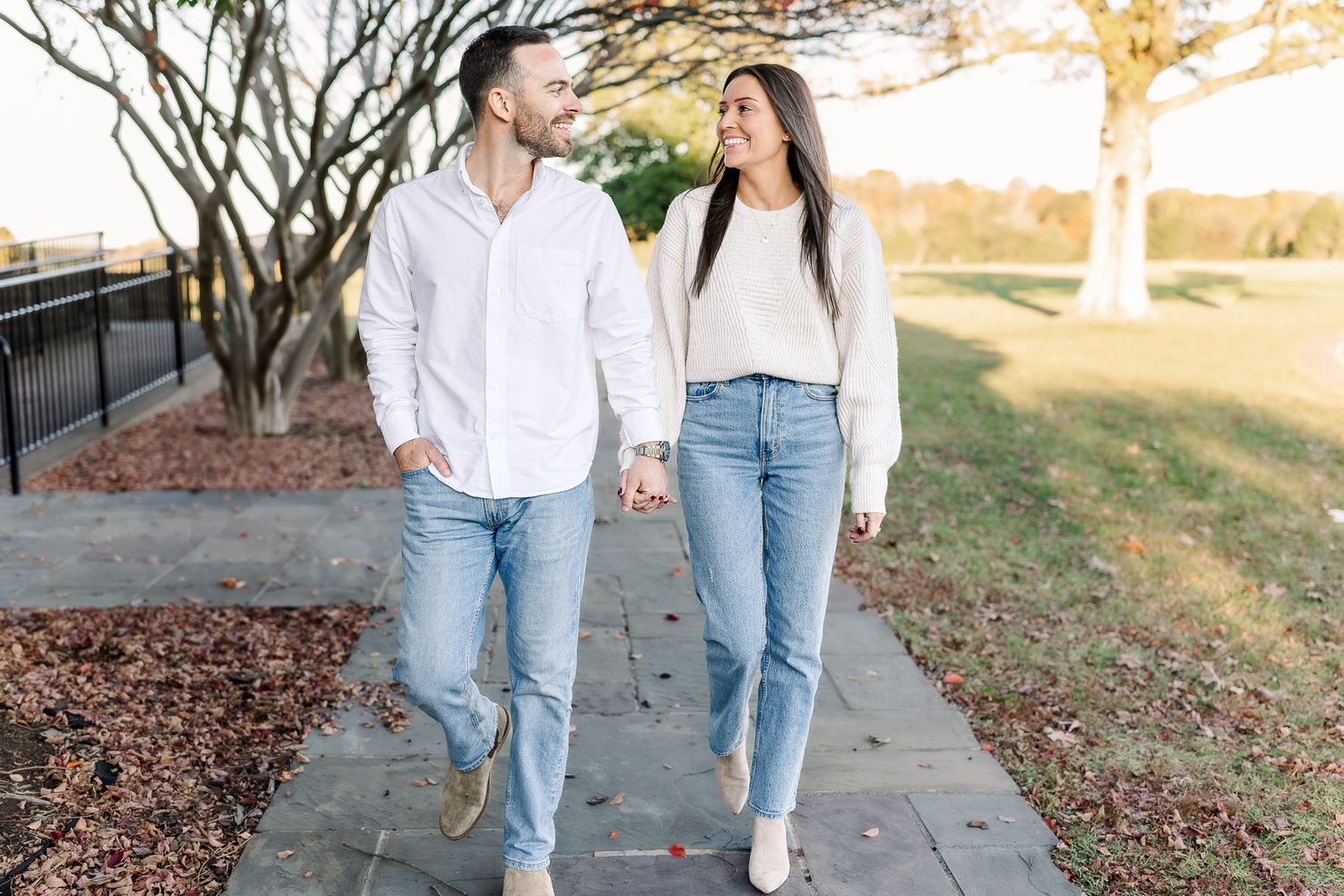 a young couple smiling together during sunset in manassas virginia