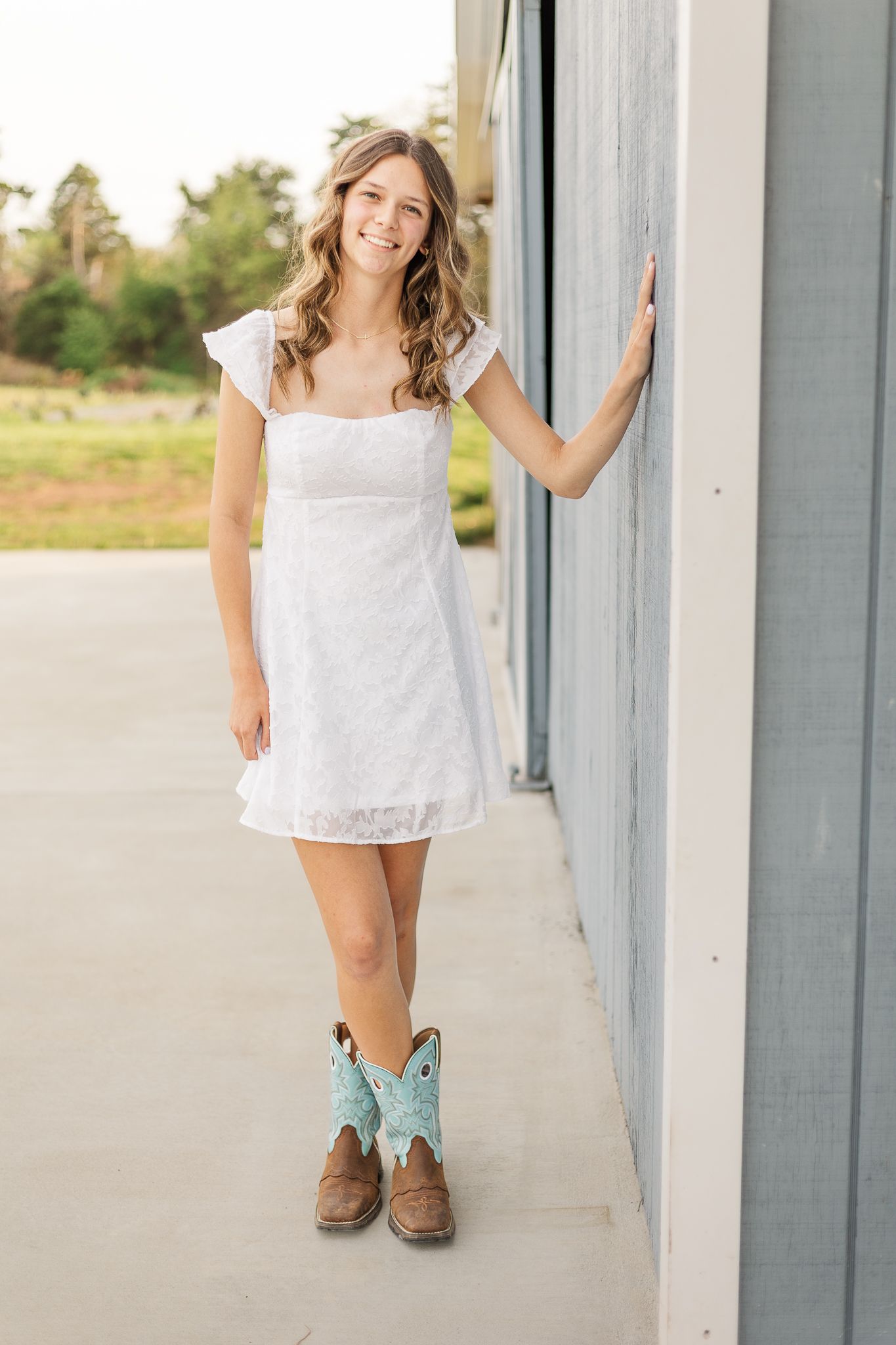 a young girl smiling during a graduation photoshoot in nokesville virginia