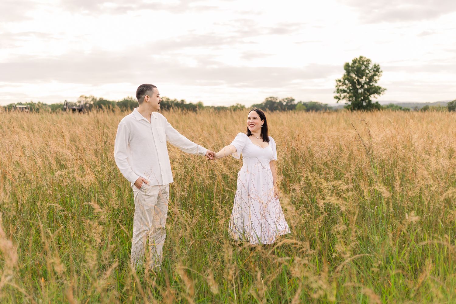 a young couple smiling together during sunset in manassas virginia