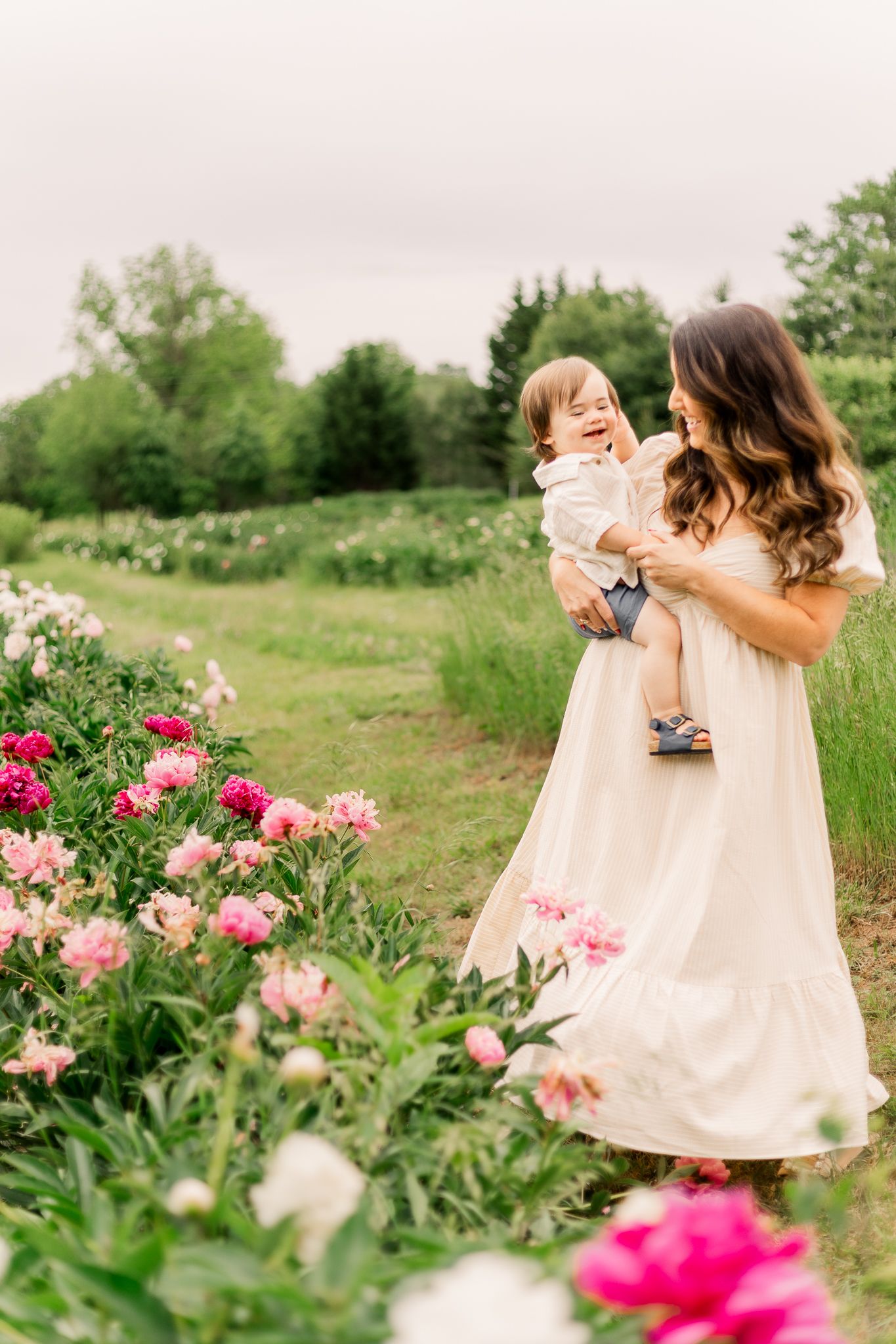 young family smiling together during spring in nokesville, virginia