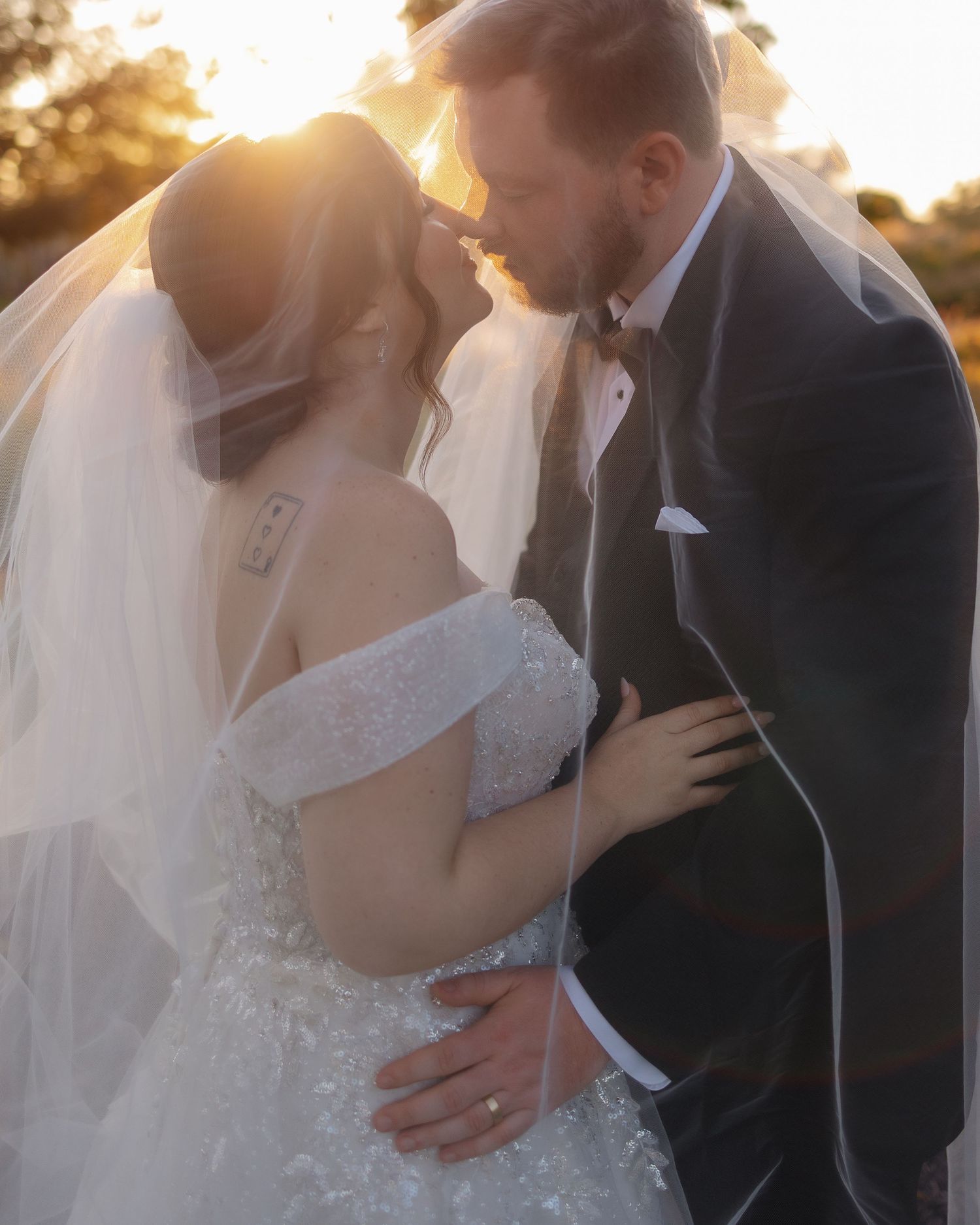 Bride and groom in elegant natural light wedding portrait in Kansas and East Texas