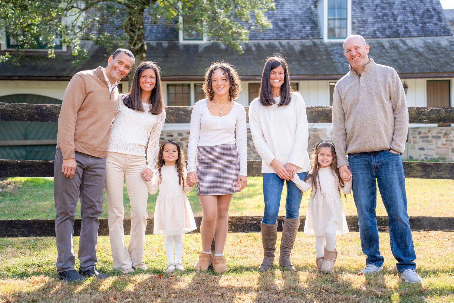 A series of candid outdoor family photos showing people standing together in casual clothing against natural backgrounds.