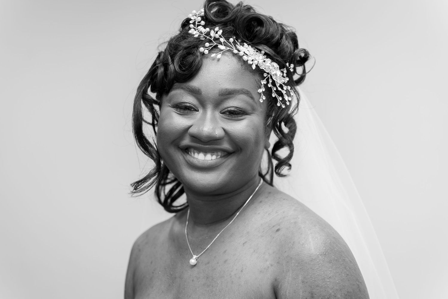 Close-up portraits showing joyful expressions during a wedding celebration.