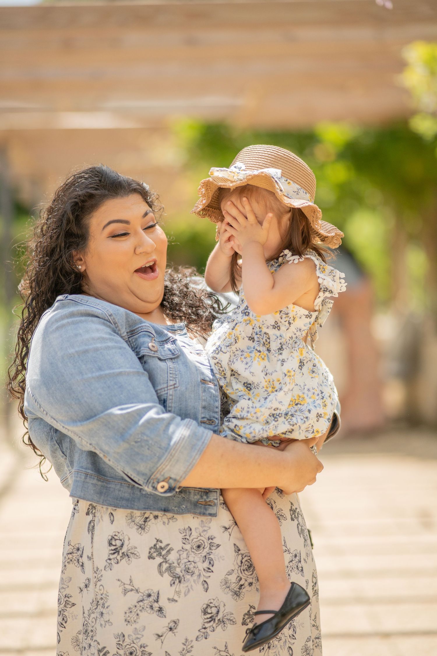 Mom and daughtersharing an emotional embrace for family portraits in Wheaton, Maryland