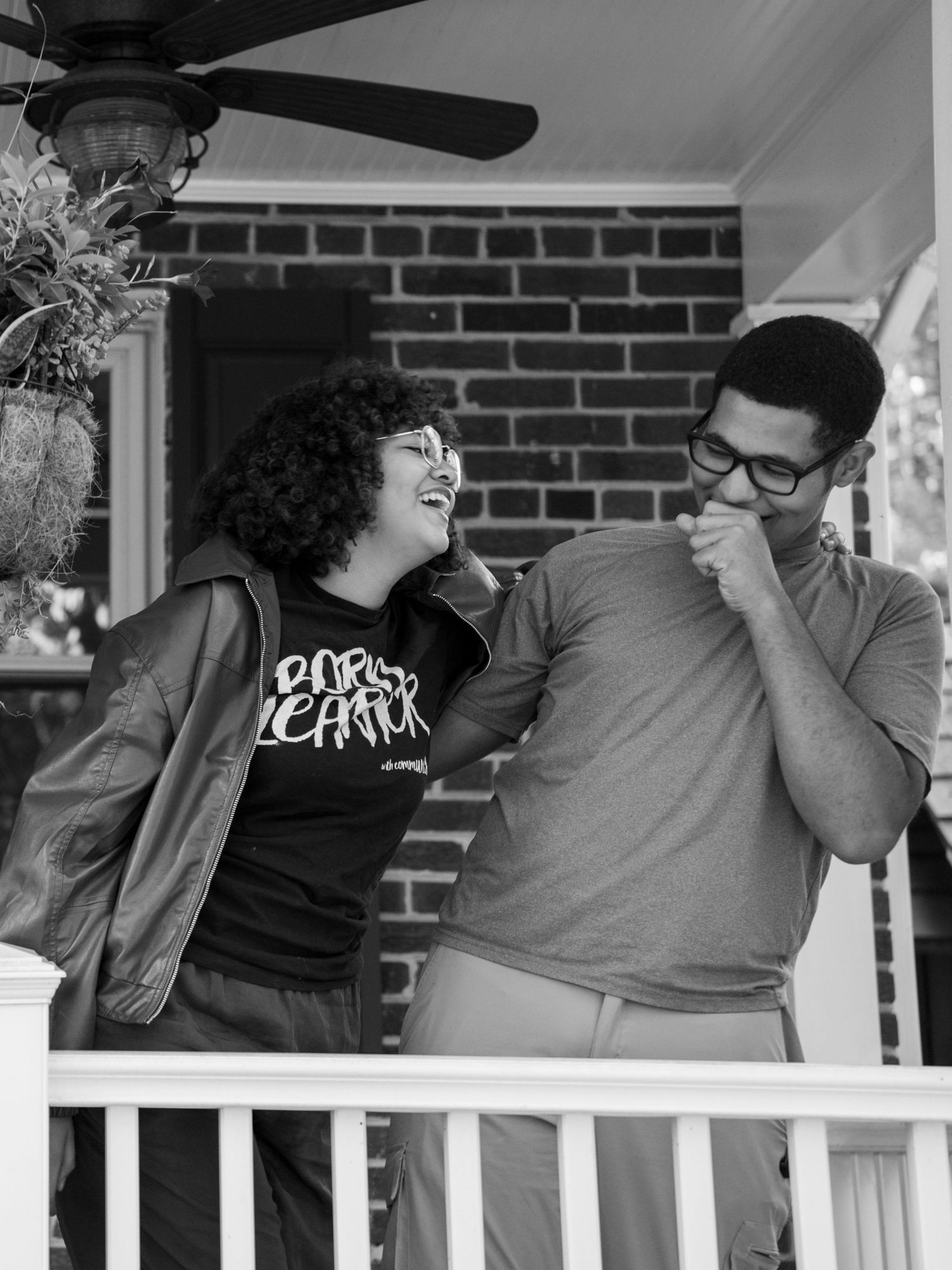 A series of black and white photos showing siblings sharing playful and candid moments on a porch.