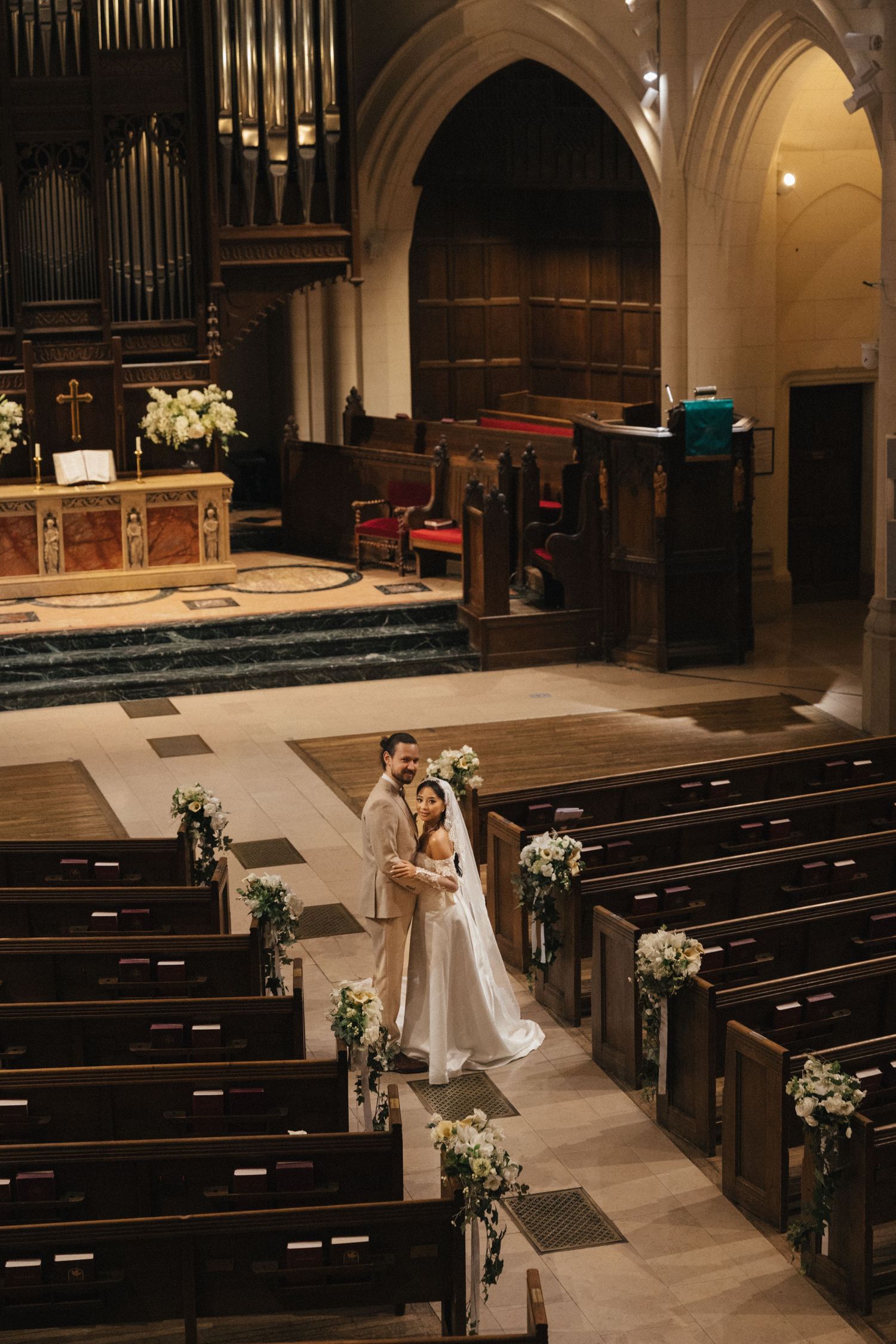 american church in paris wedding couple portraits in the church interior