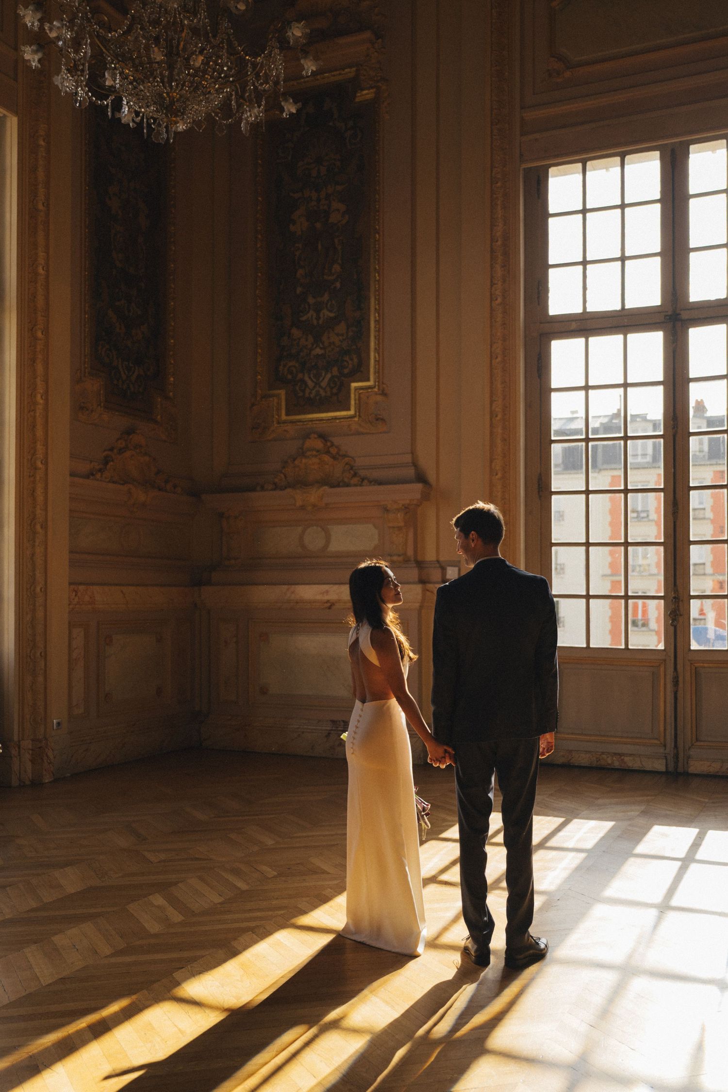 Civil wedding ceremony at Mairie de Levallois-Perret, couple portrait standing in the golden ballroom