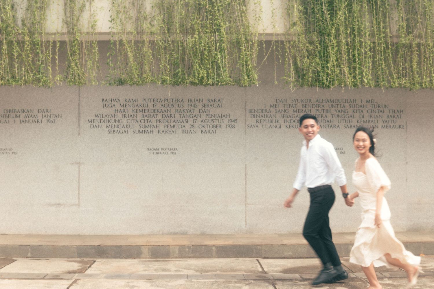 Cinematic and romantic couple photoshoot at taman benteng jakarta, couple running and blurry