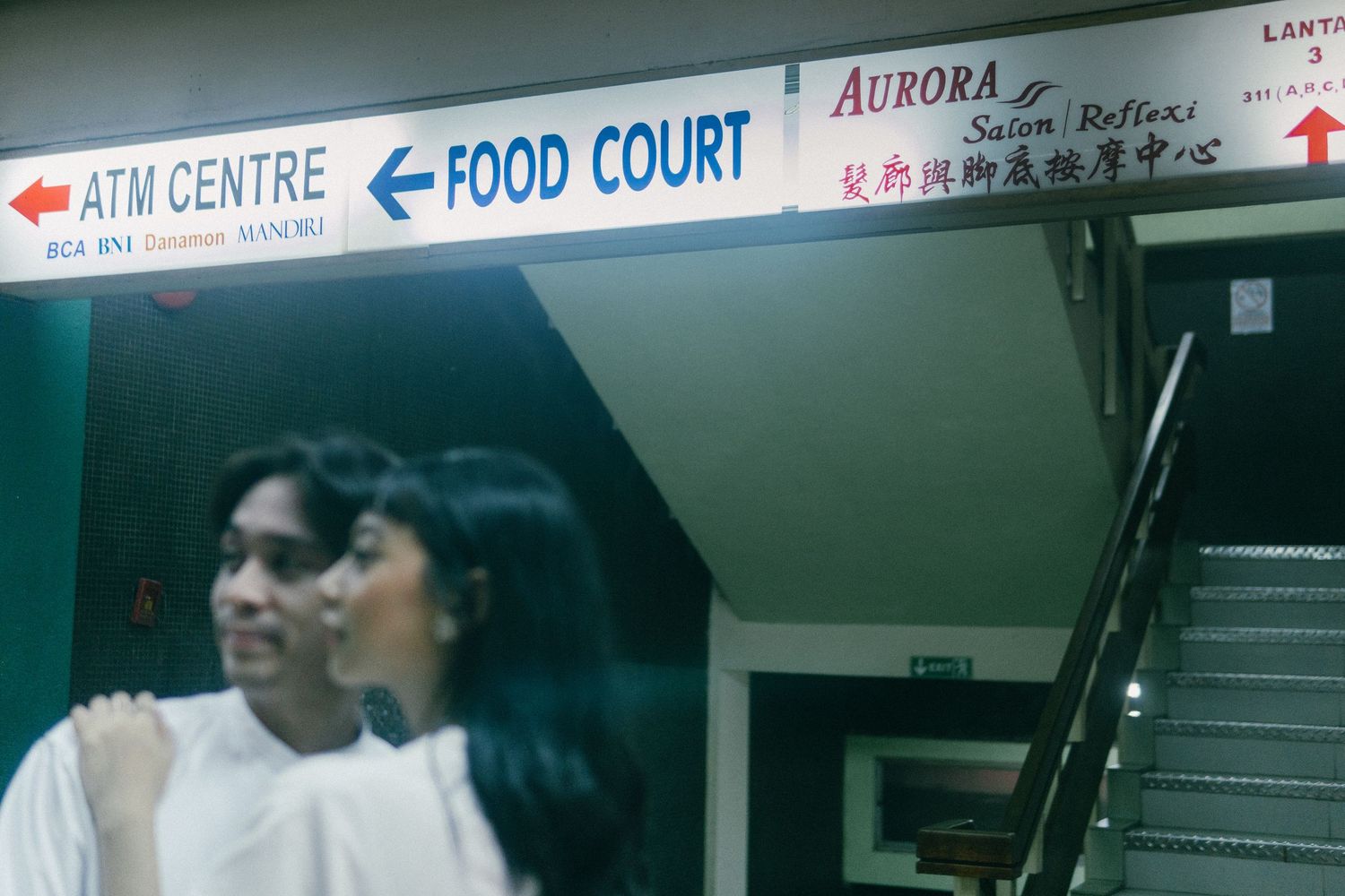 Wong Kar Wai inspired couple photoshoot in North Jakarta with neon signage
