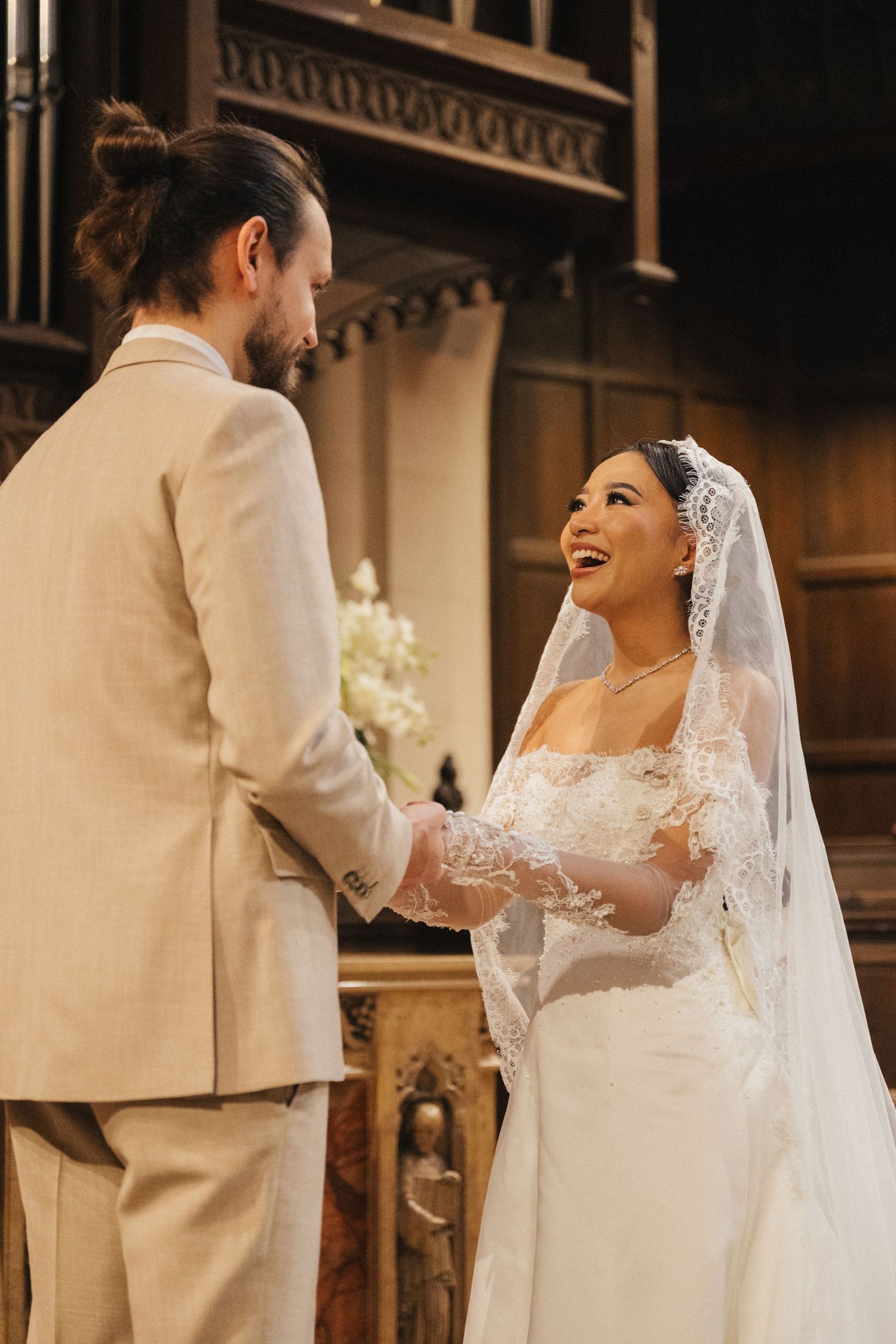 American Church in Paris wedding ceremony, bride looking at the groom lovingly