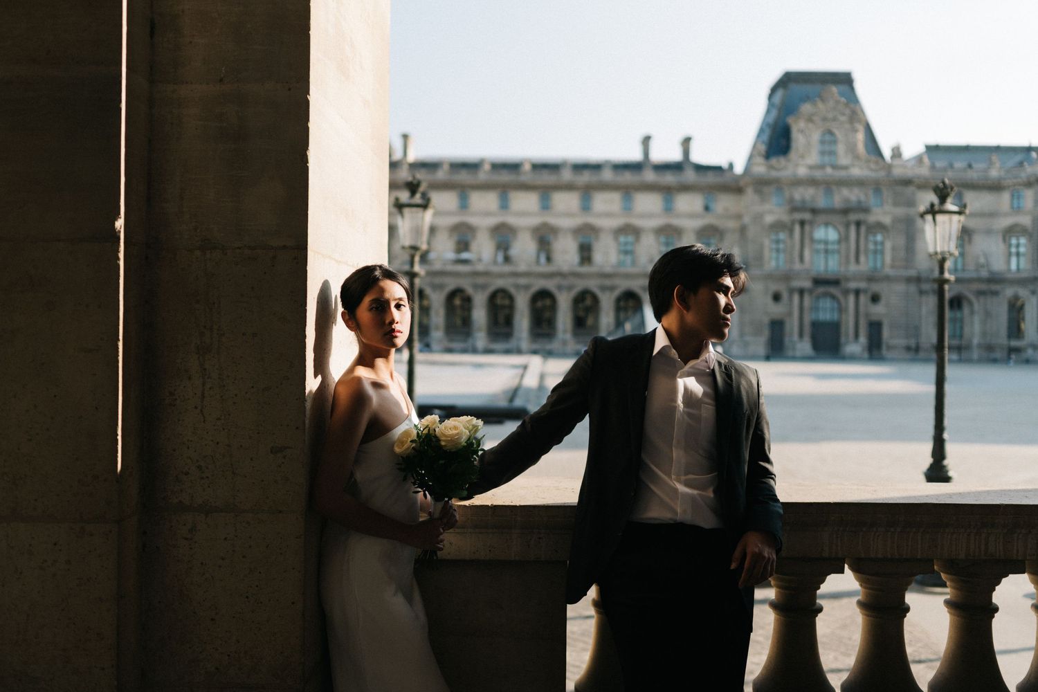 Asian couple pre-wedding at the louvre Paris with cinematic lights and shadows