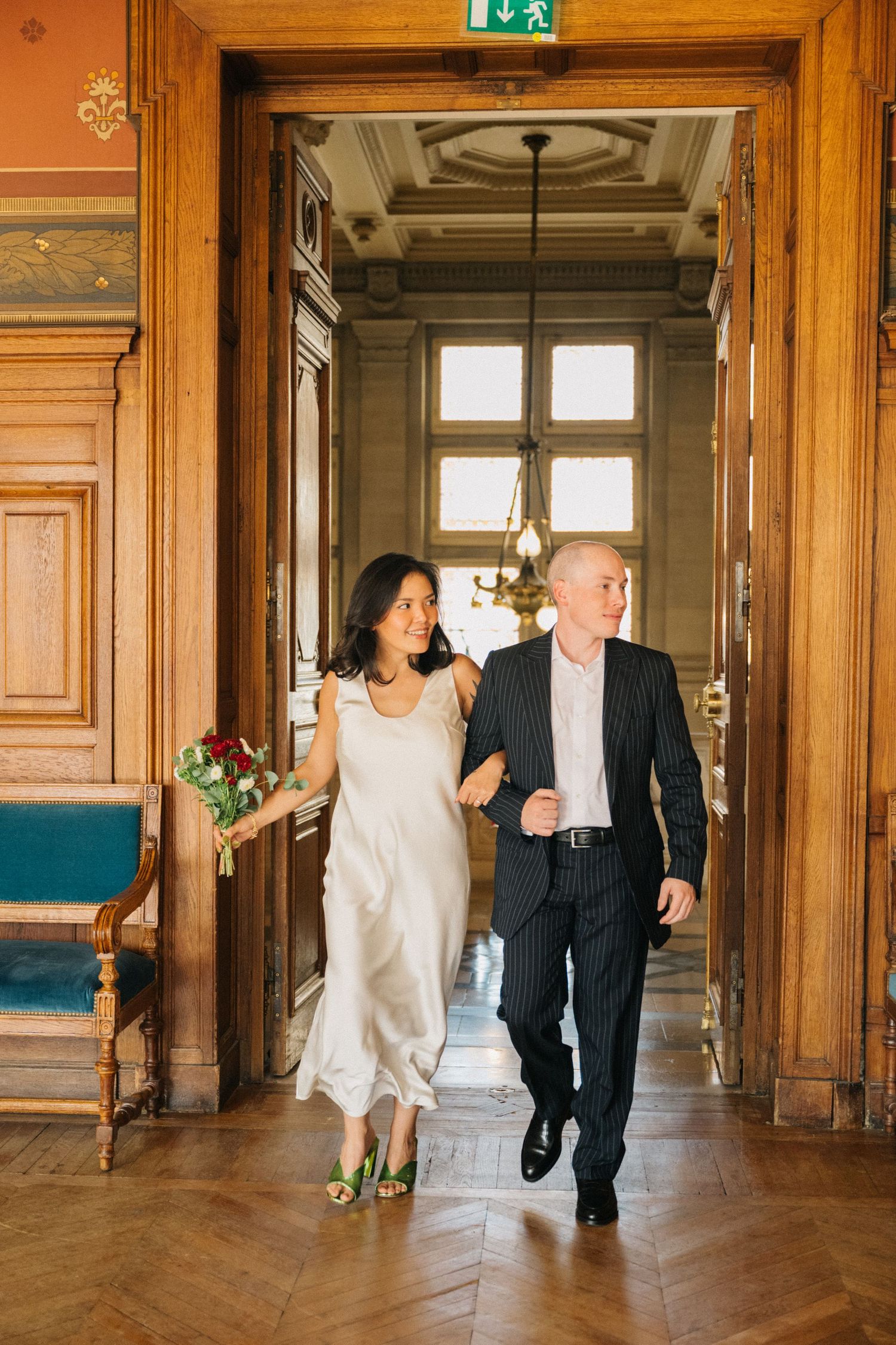 Civil wedding ceremony at mairie 14ème paris, bride and groom walk in to room