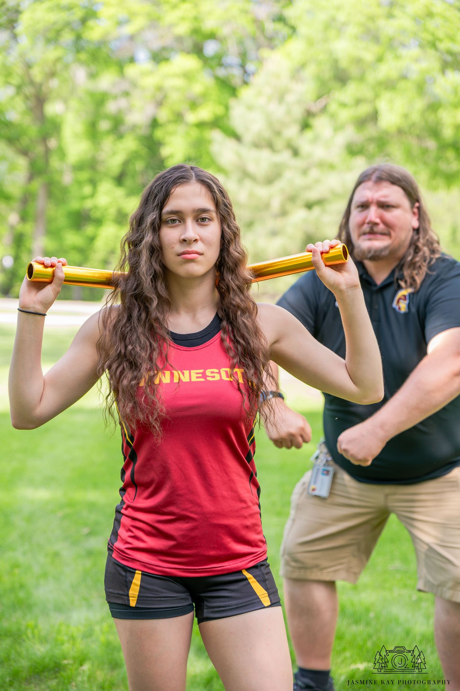 A sequence showing outdoor exercise training with a yellow foam roller being used for stretching and mobility work.