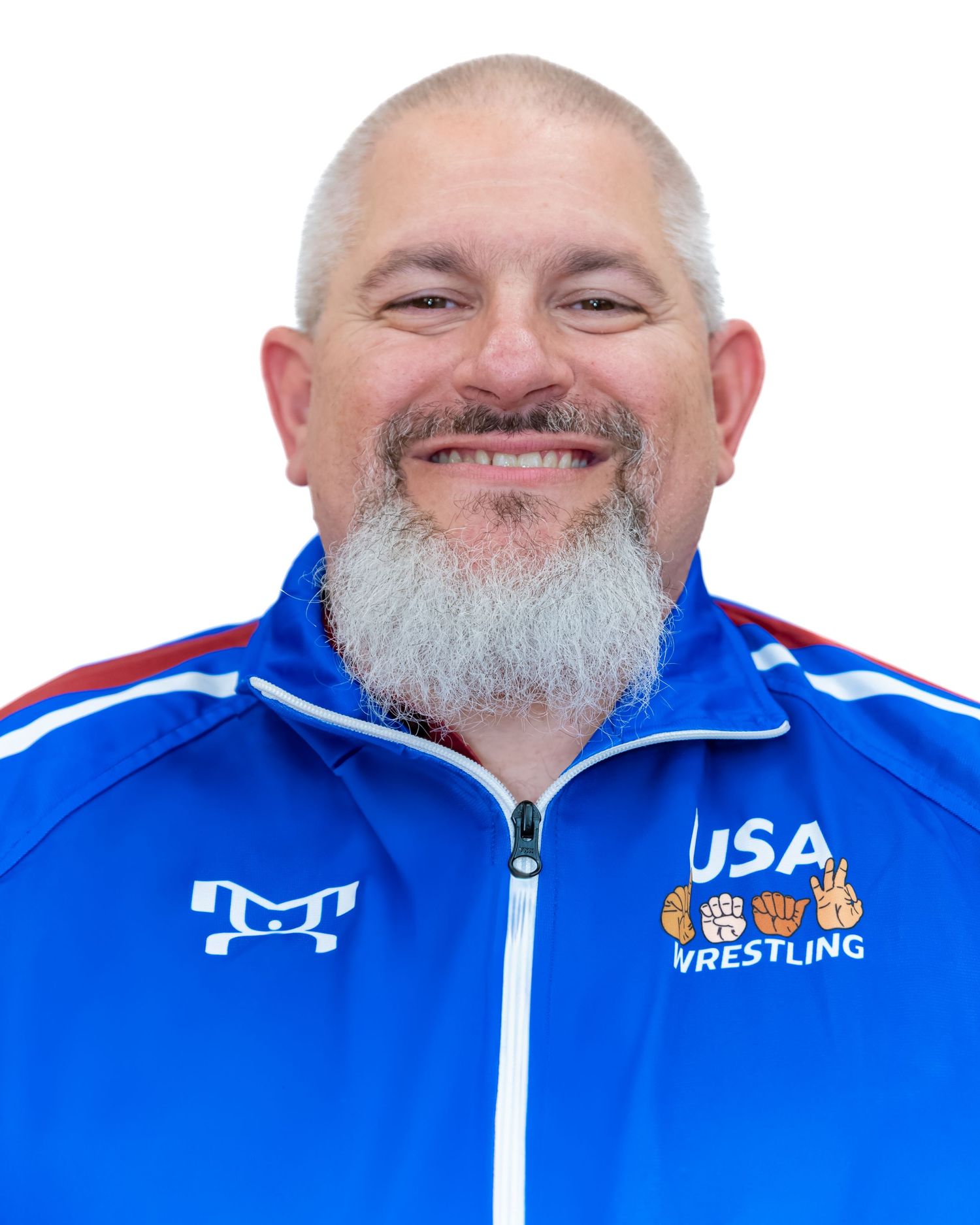 Smiling team member in blue USA Wrestling jacket with gray beard.