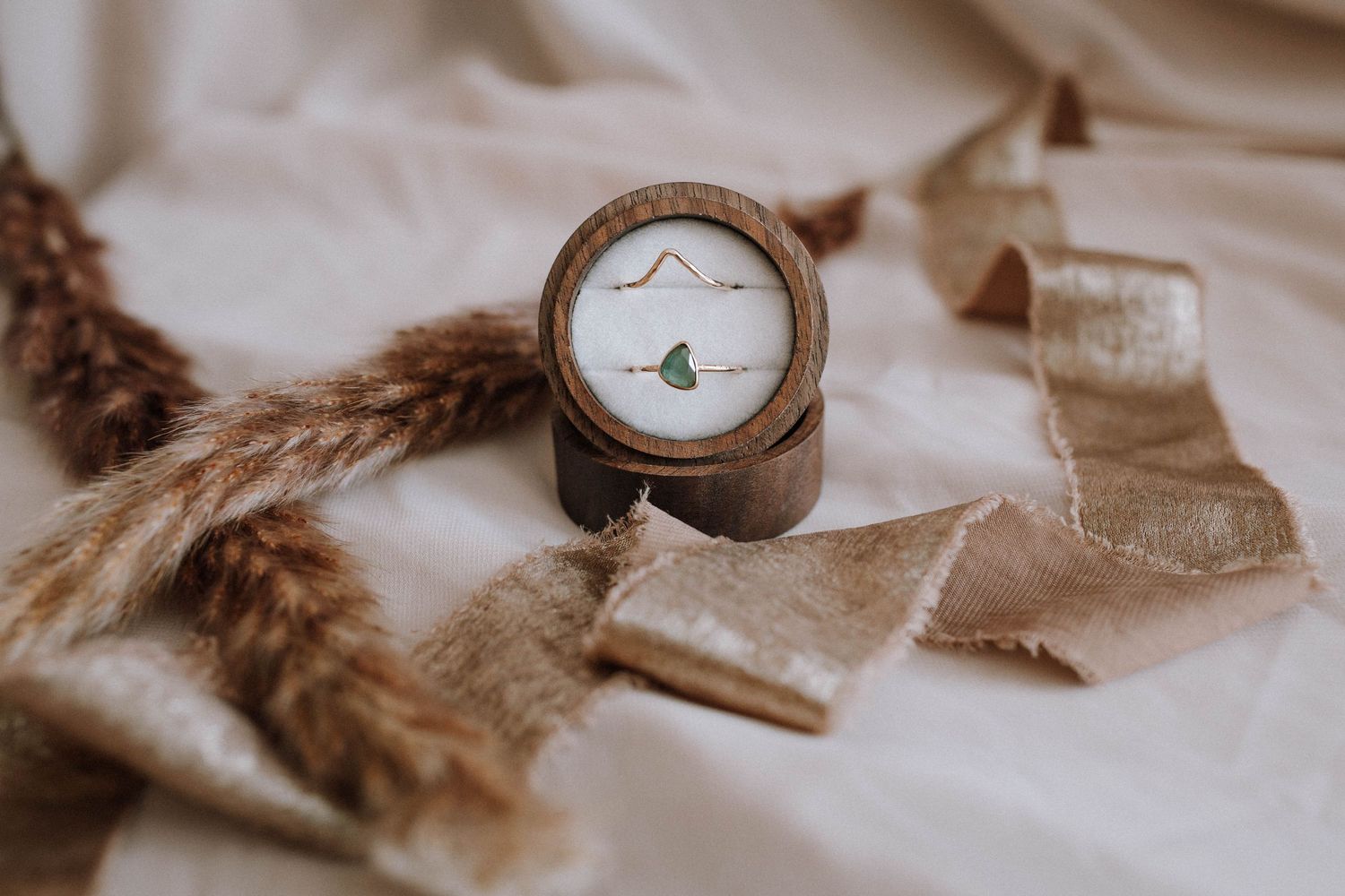 A collection of vintage-style watches and accessories arranged artistically on a beige surface.