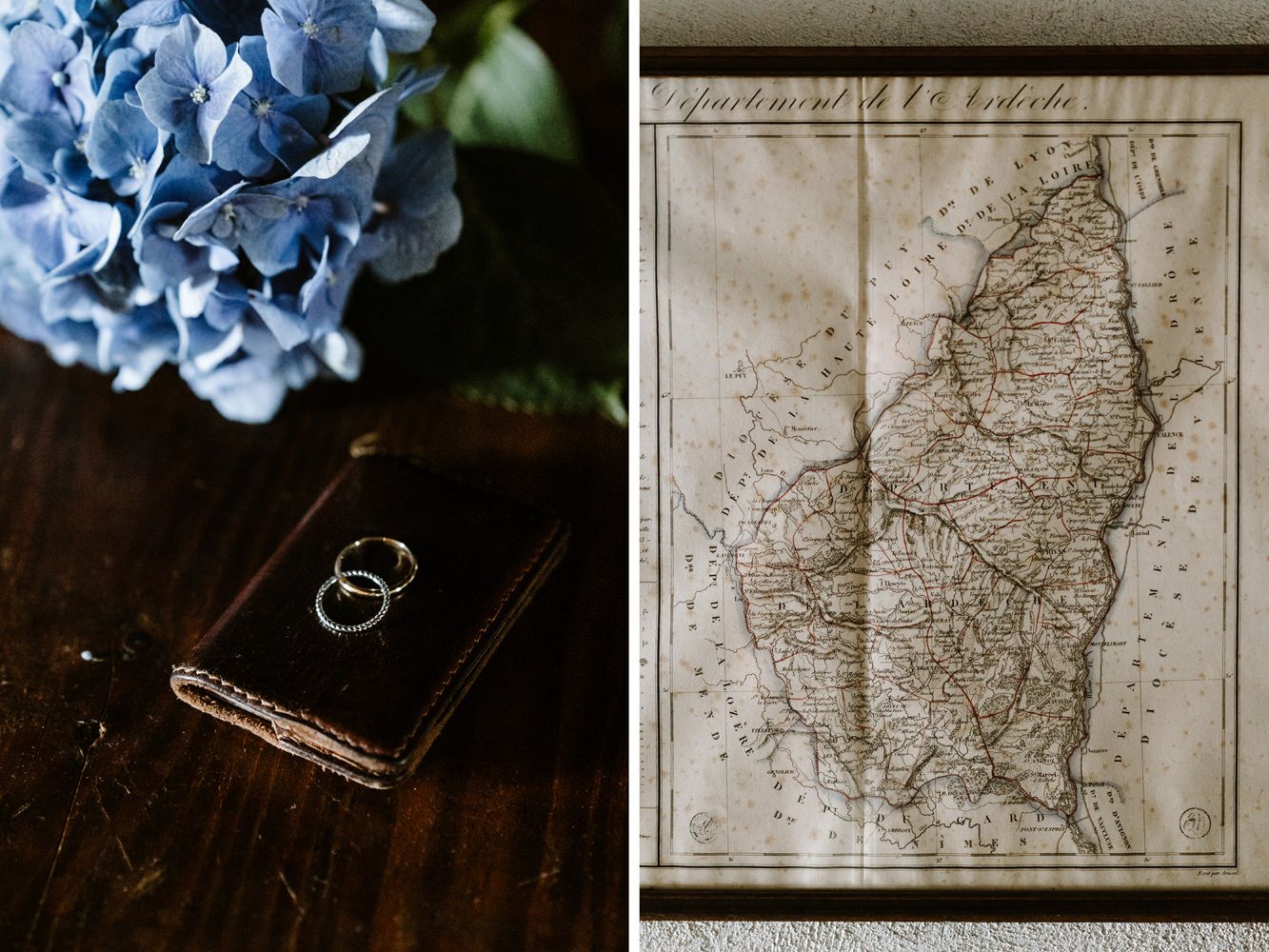 Vintage maps and blue hydrangeas arranged on a dark wooden surface.