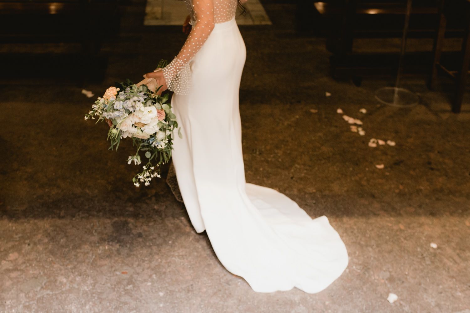 Evening outdoor wedding photography with soft lighting and romantic atmosphere.