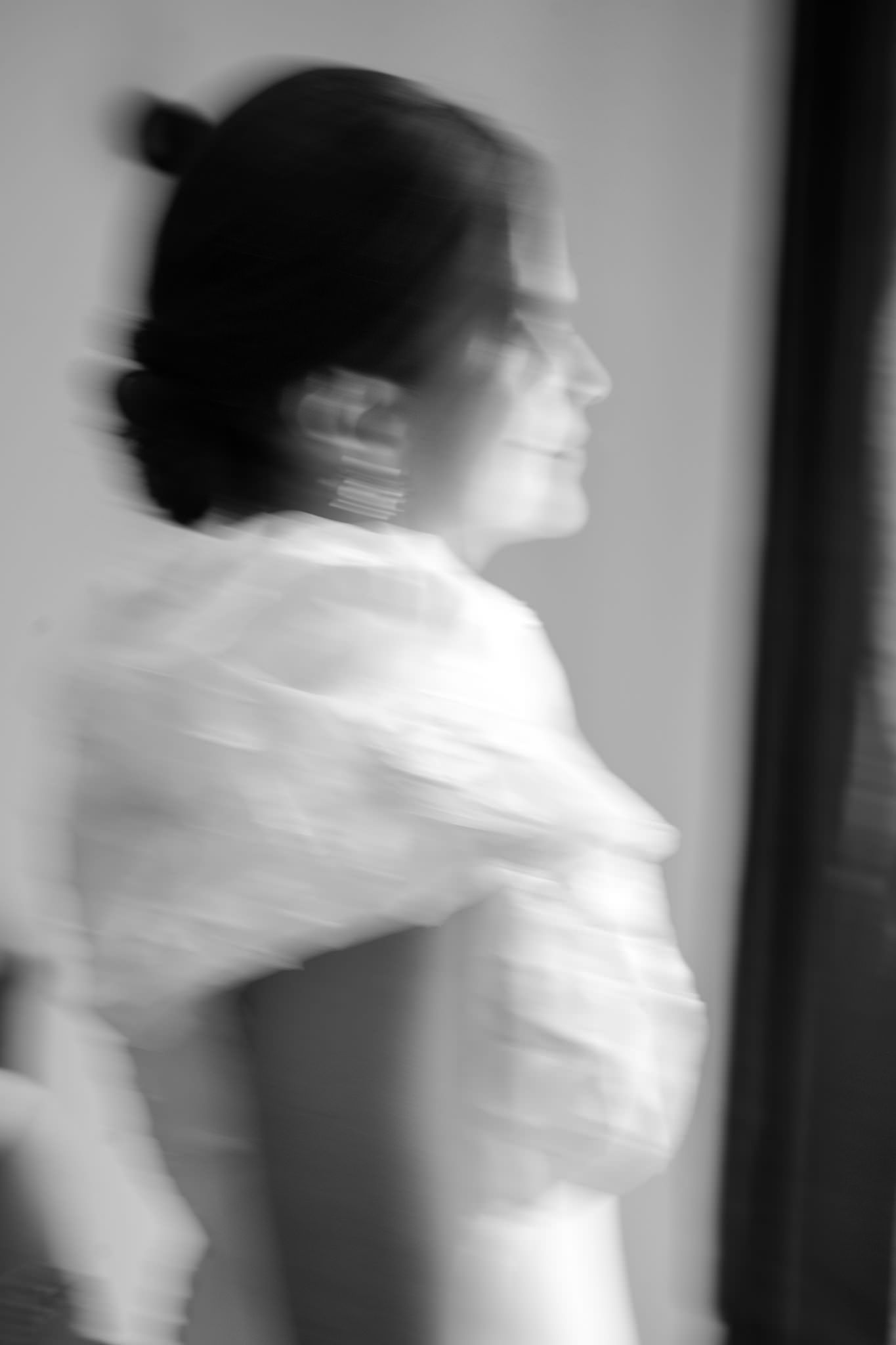 Abstract motion blur series in black and white showing movement and flow.