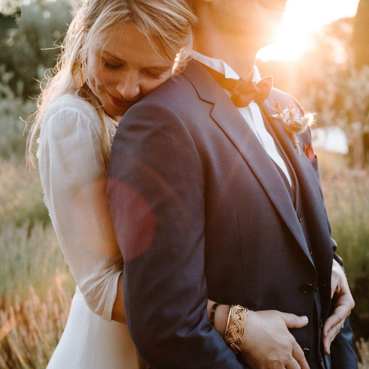 Intimate wedding couple portrait session during golden hour.