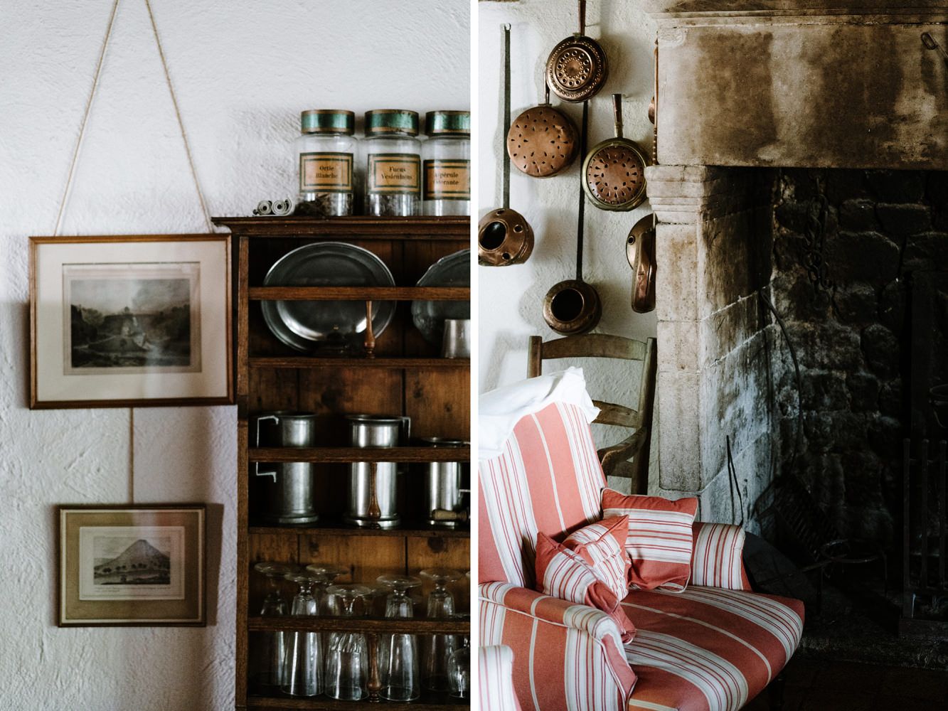 Rustic interior with vintage shelving, framed artwork, and striped armchair near fireplace.