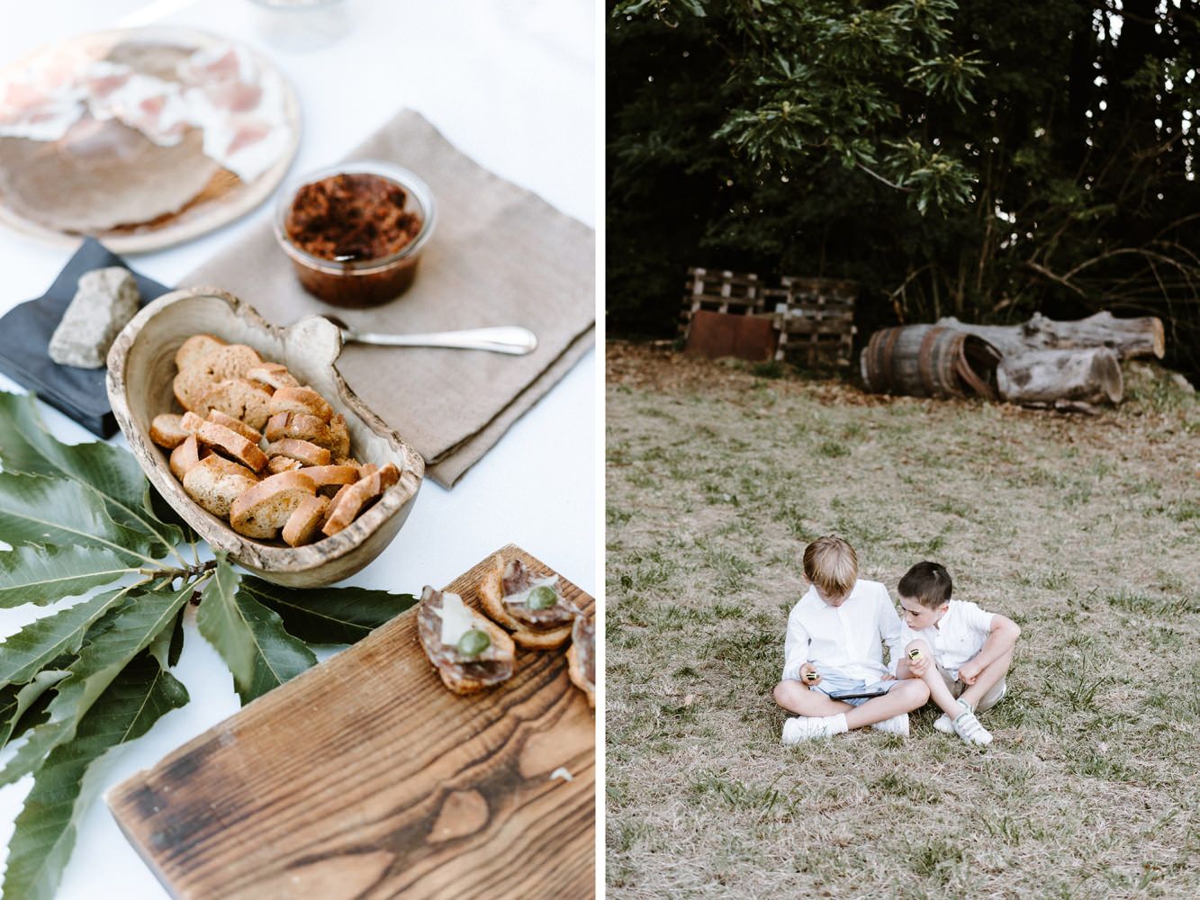 Wedding reception details with wooden charcuterie boards and appetizers on grass.