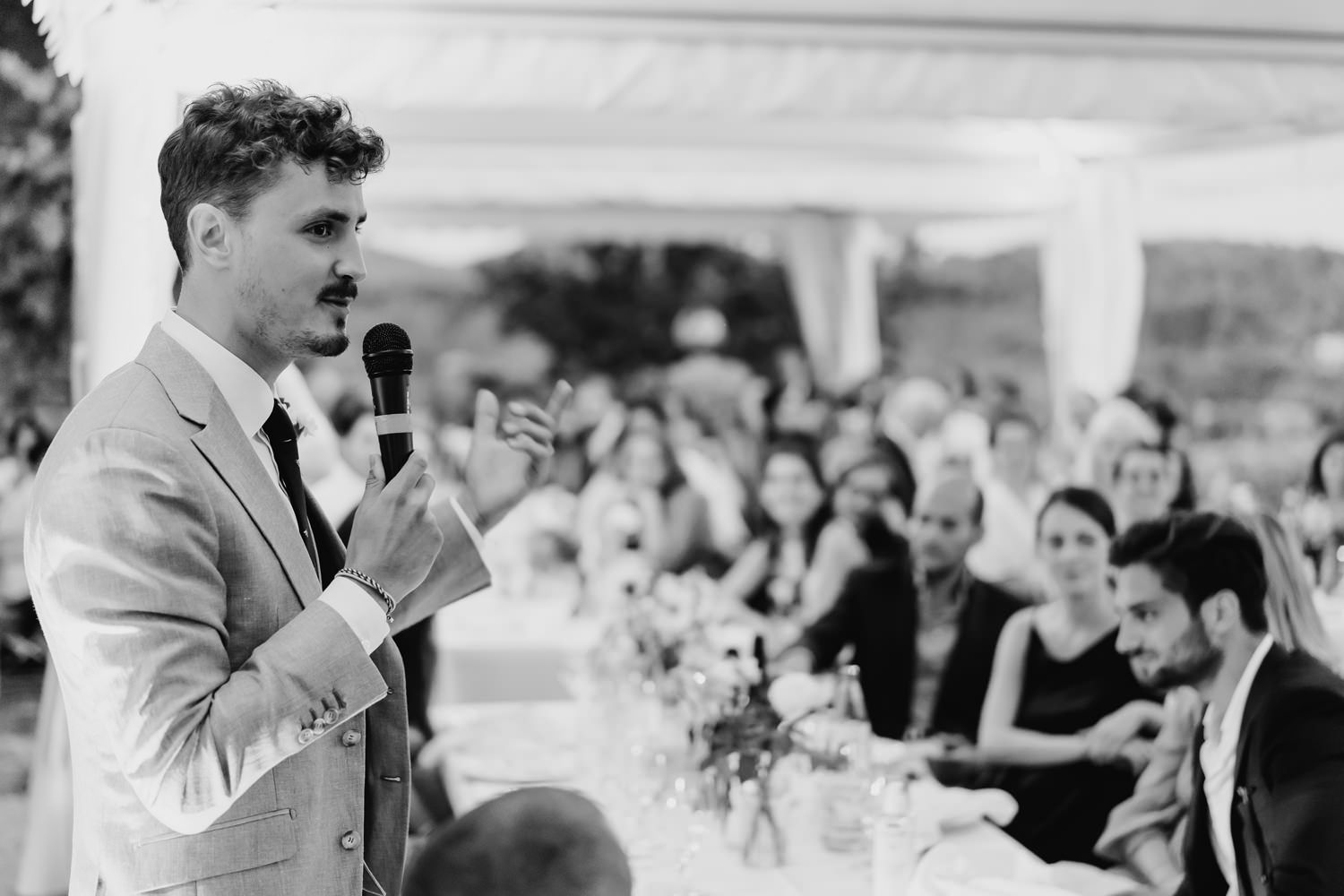 Black and white photos of emotional wedding speeches and reactions.