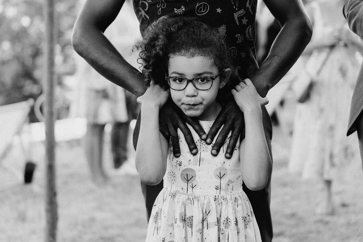 Black and white portraits of children at a formal event.