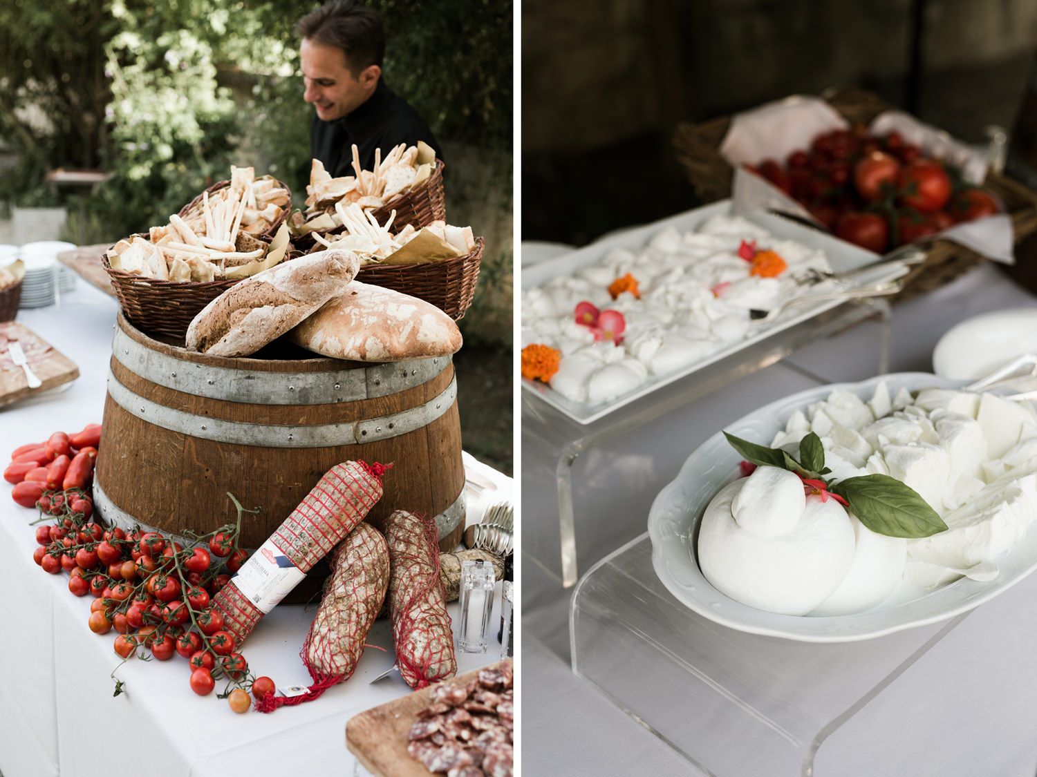 Elegant wedding reception food spread with artisanal breads, meats, and berries on white tablecloths.